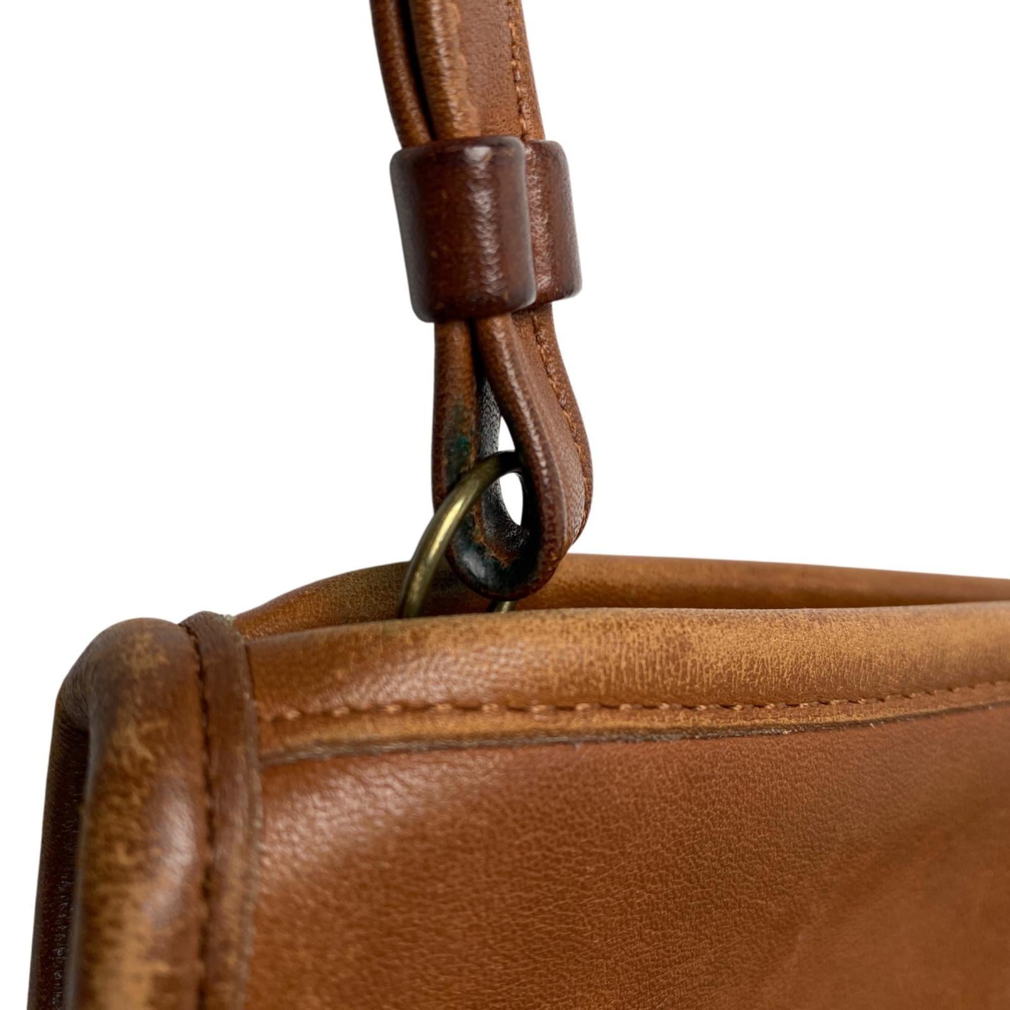 Coach Brown Leather Clutch Bag (Pre-Owned)