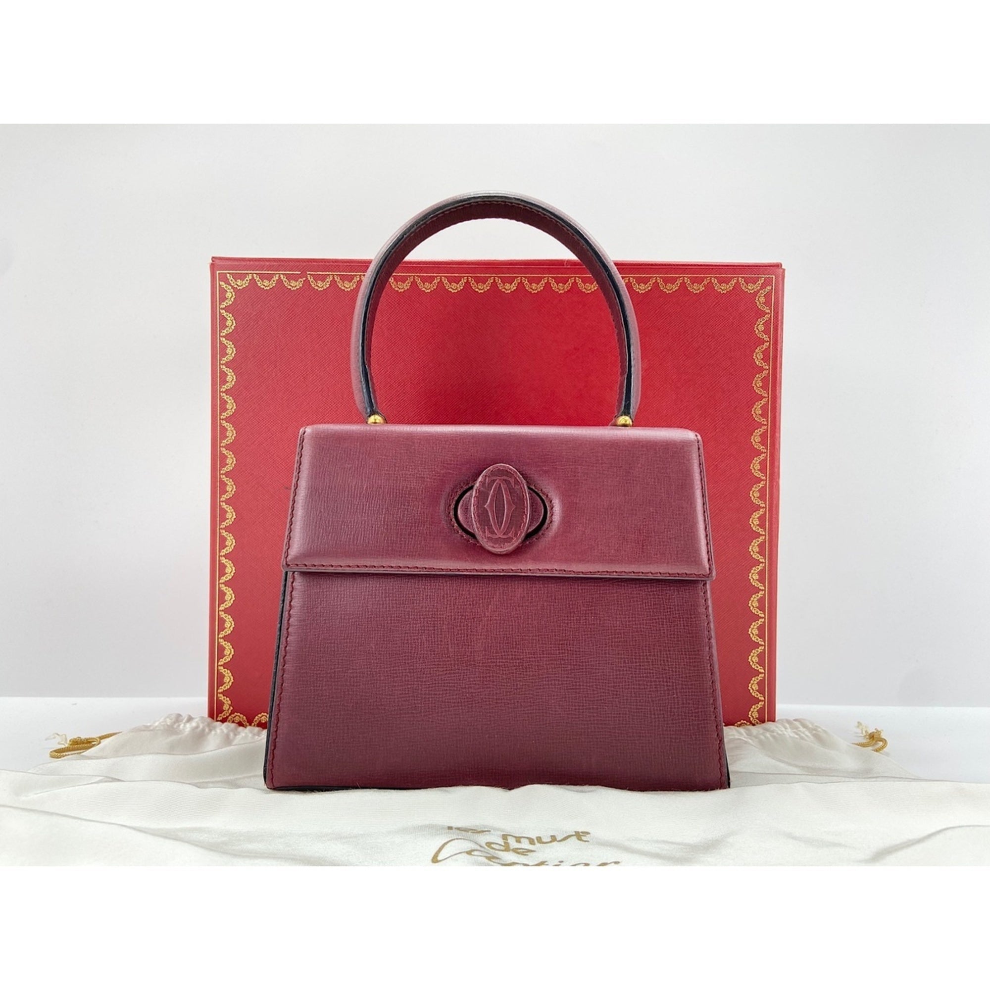 Cartier Must Wine Red Handbag (Pre-Owned)