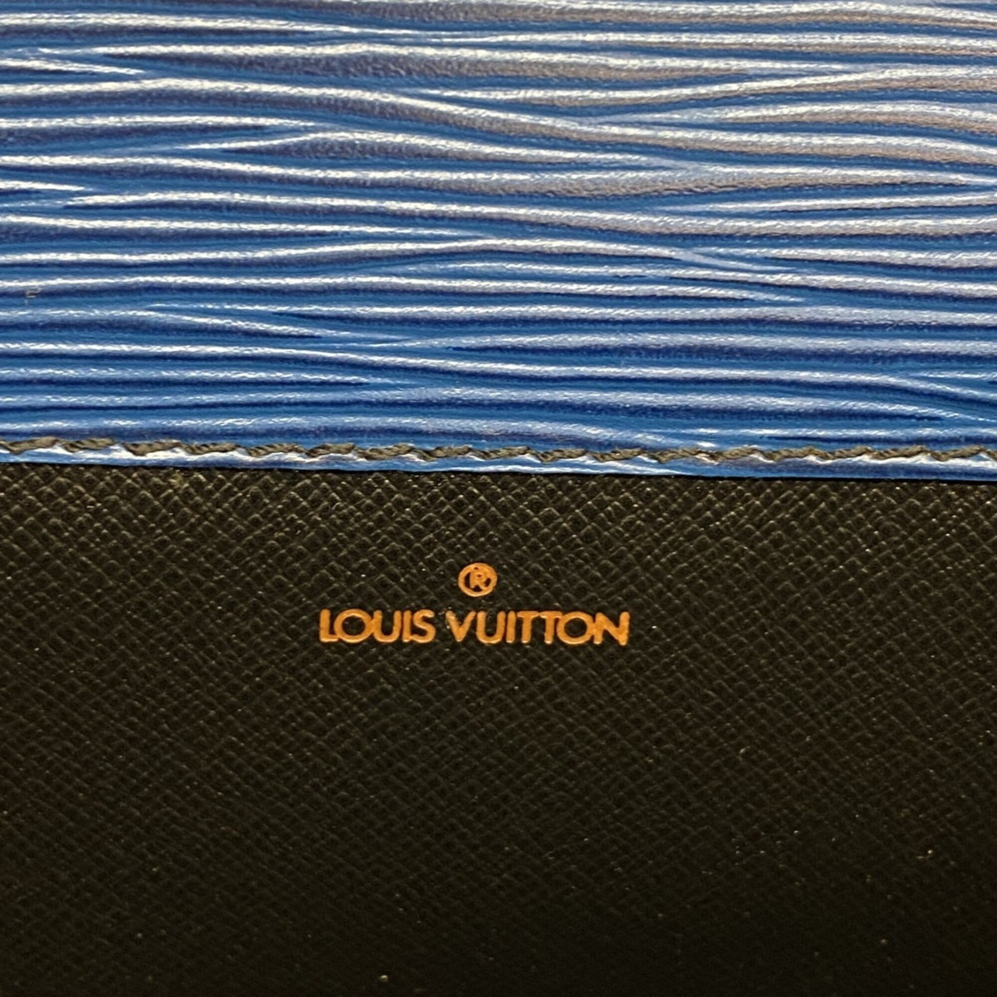 Louis Vuitton Toledo Blue Clutch Bag (Pre-Owned)