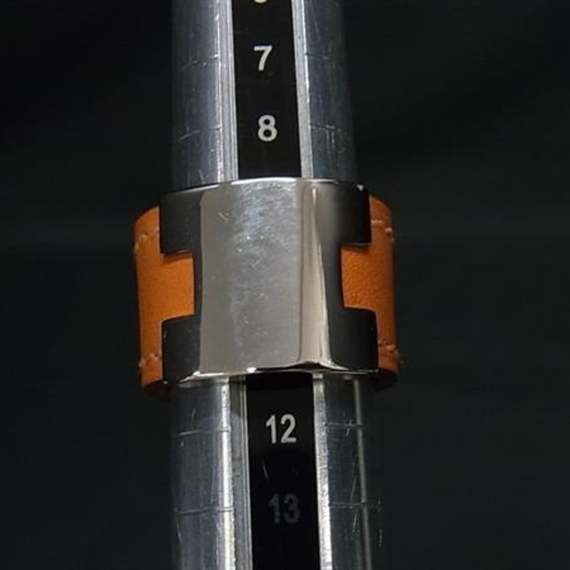 Hermes Lurie Silver Orange Metal Swift Leather Band Ring (Pre-Owned)