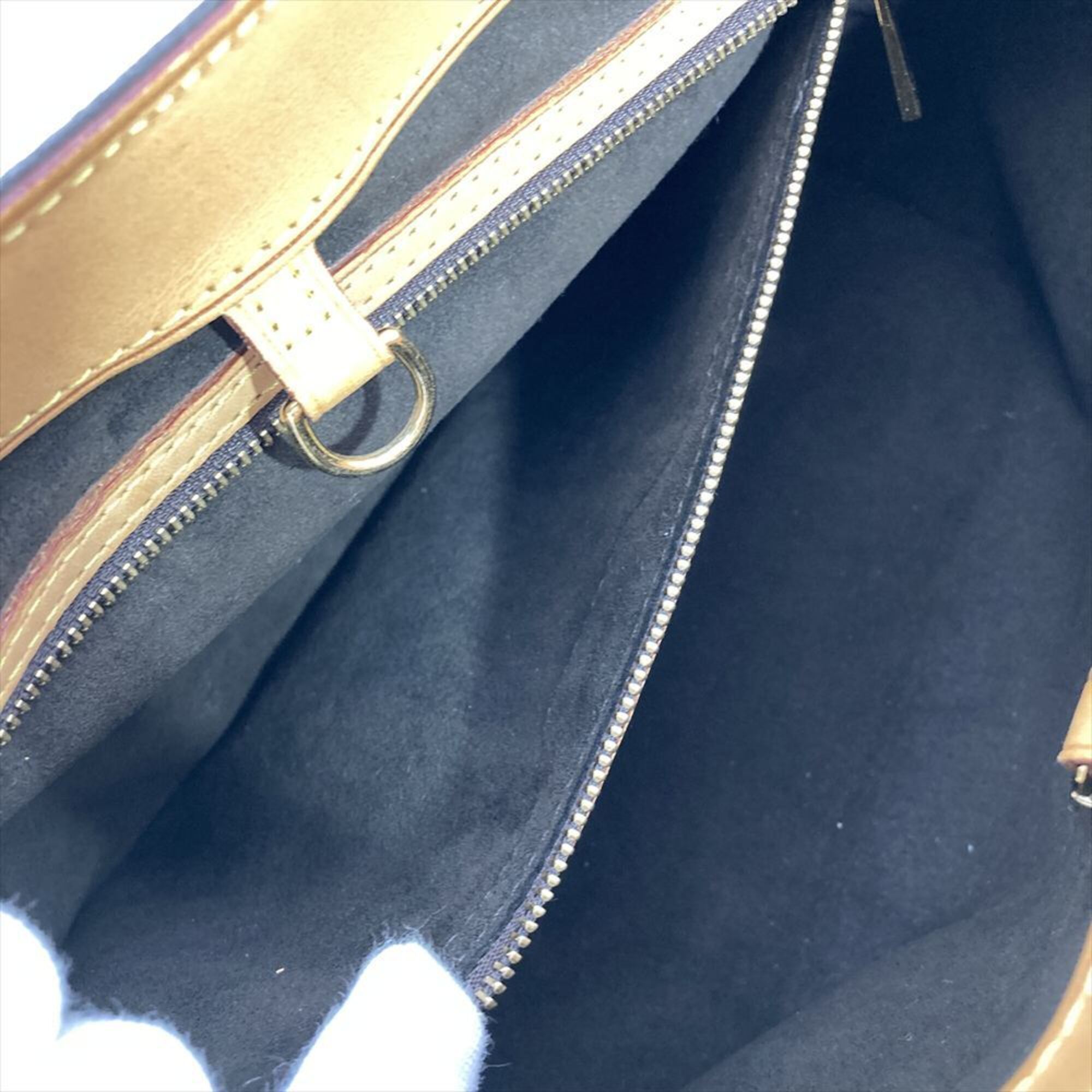 Louis Vuitton Brown Monogram Canvas Handbag (Pre-Owned)