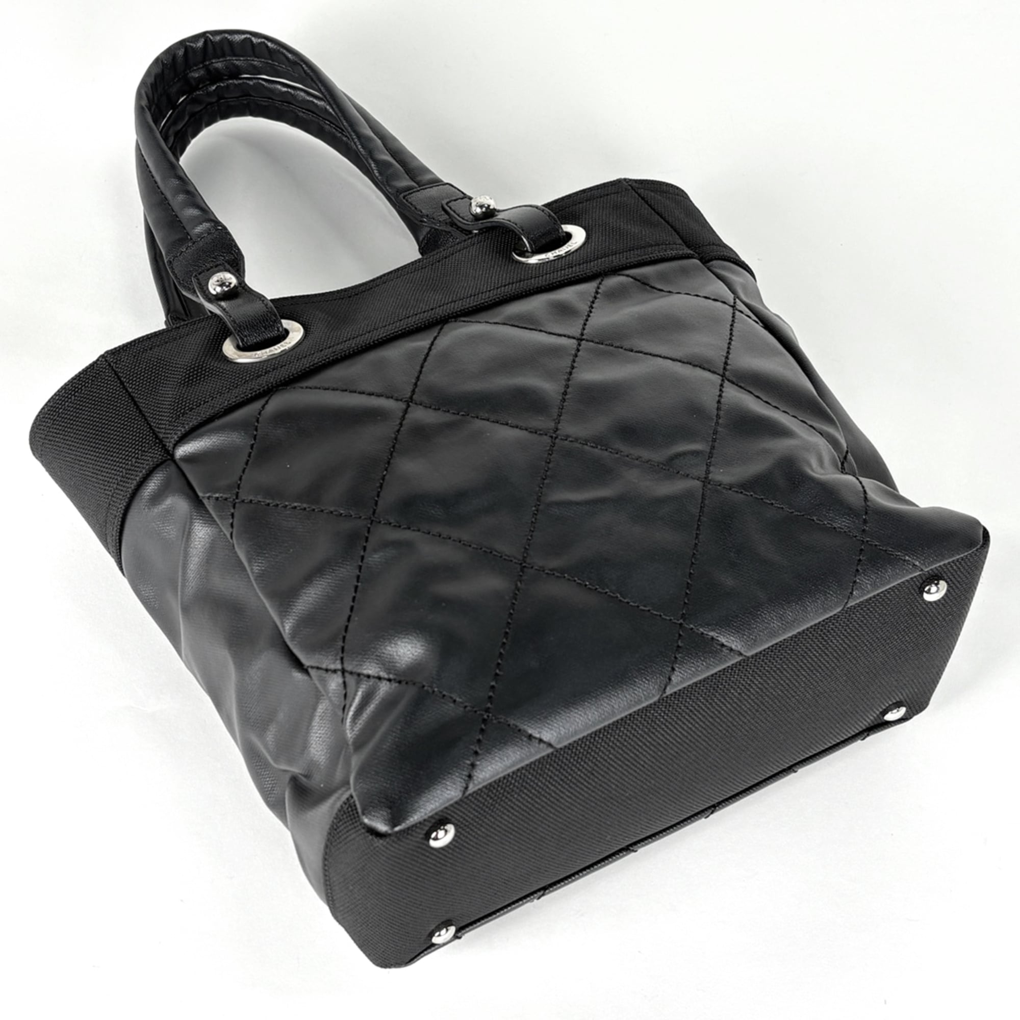 Chanel Black Coated Canvas Handbag (Pre-Owned)