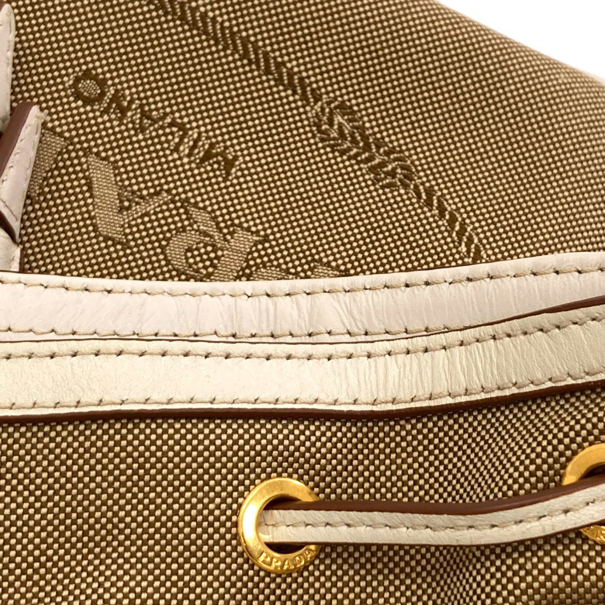 Prada Beige White Canvas Handbag (Pre-Owned)
