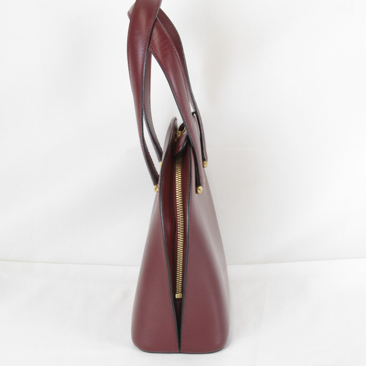 Cartier Must Wine Red Leather Handbag (Pre-Owned)