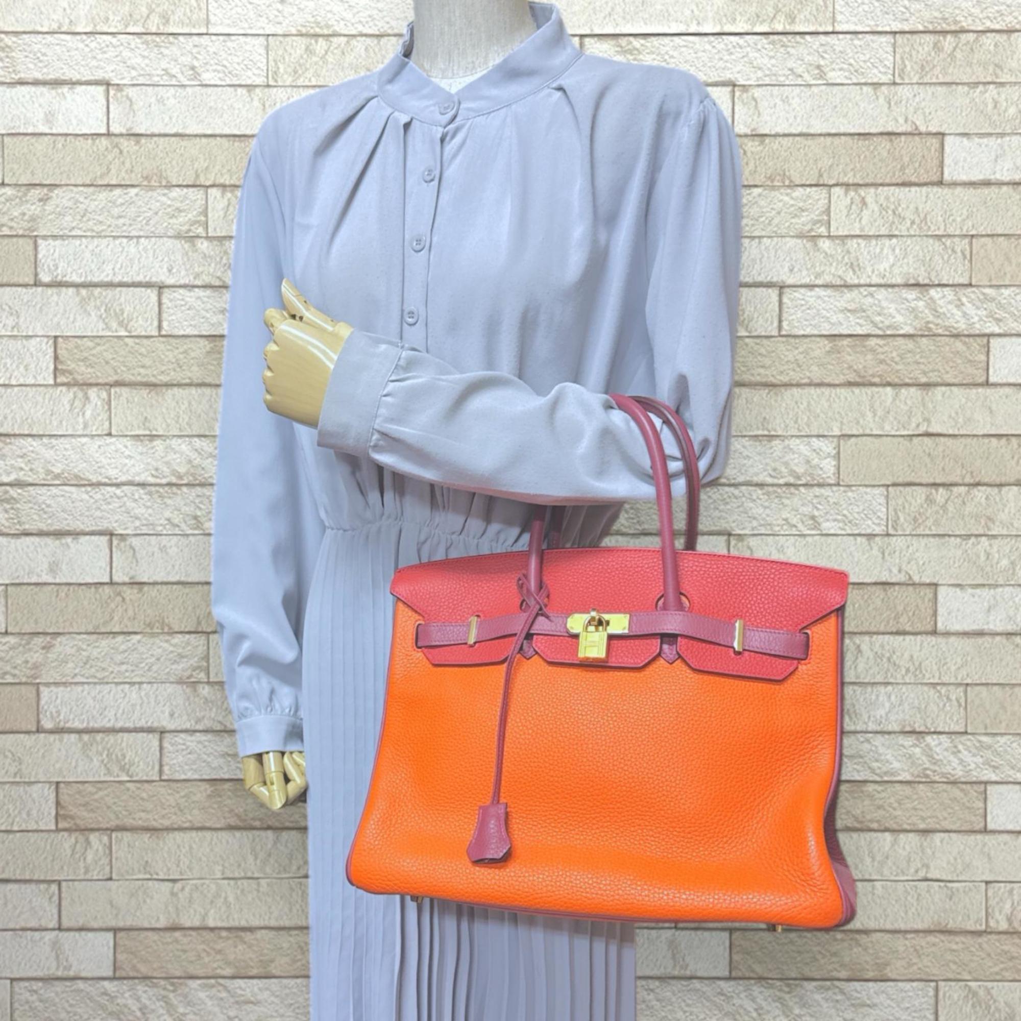 Hermes Bordeaux Orange Red Color Taurillon Clemence Leather Handbag (Pre-Owned)