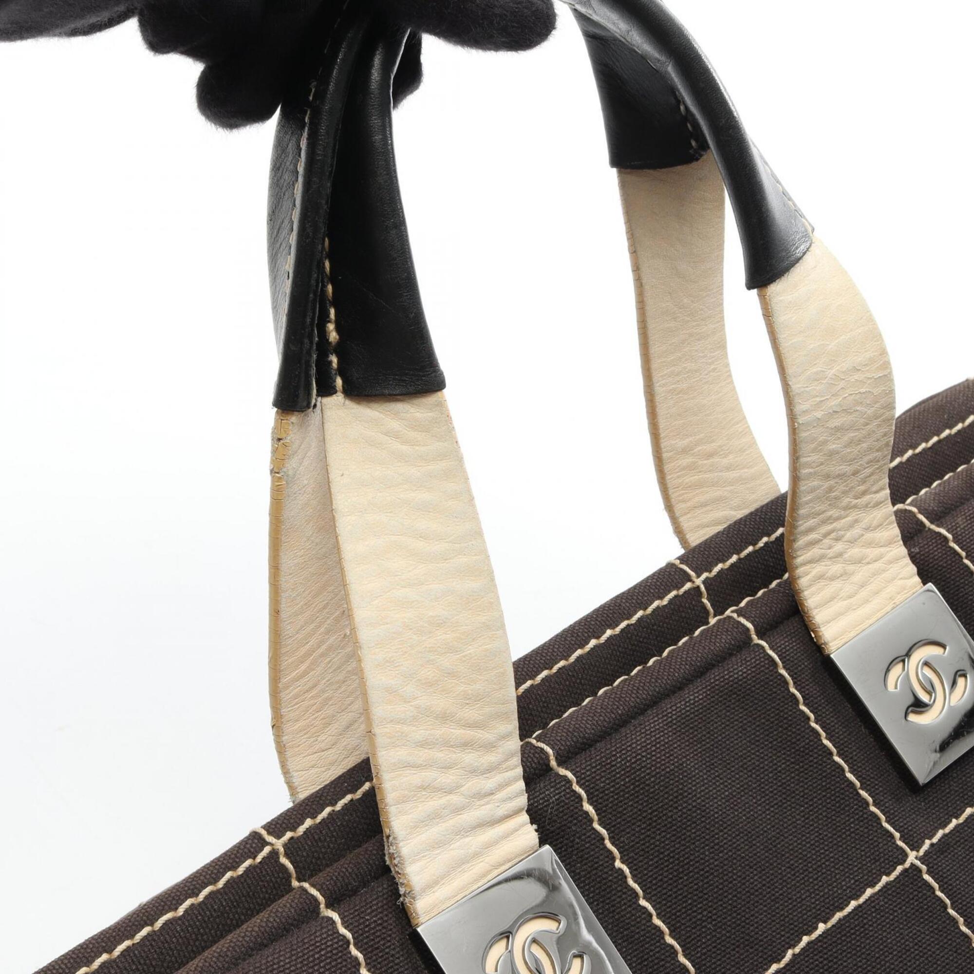 Chanel Black Leather Canvas Handbag (Pre-Owned)