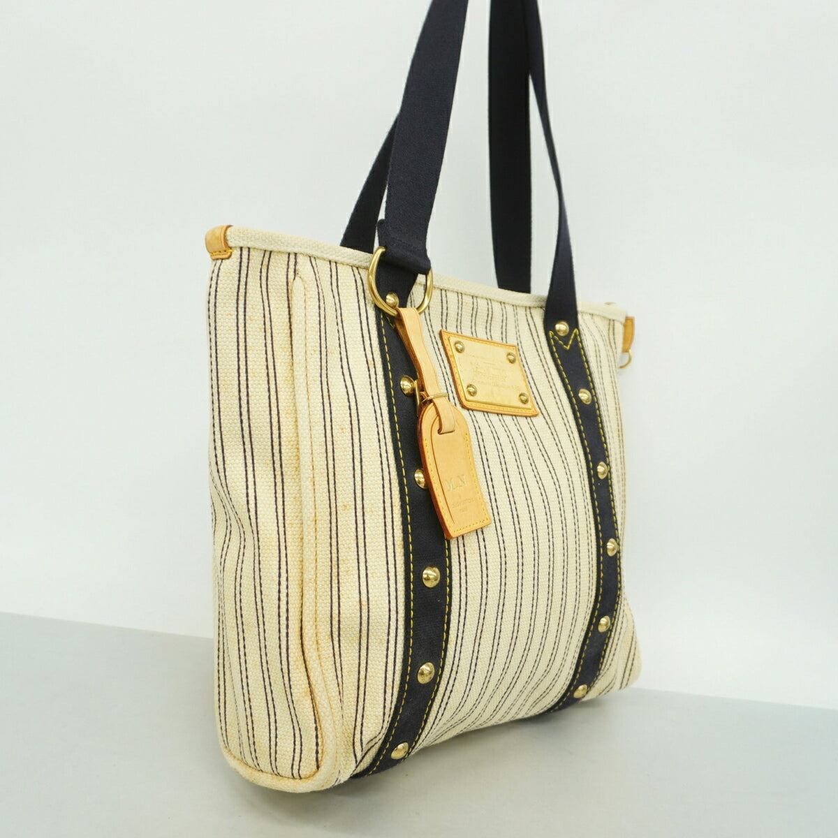Louis Vuitton Ivory Navy Tote Bag (Pre-Owned)