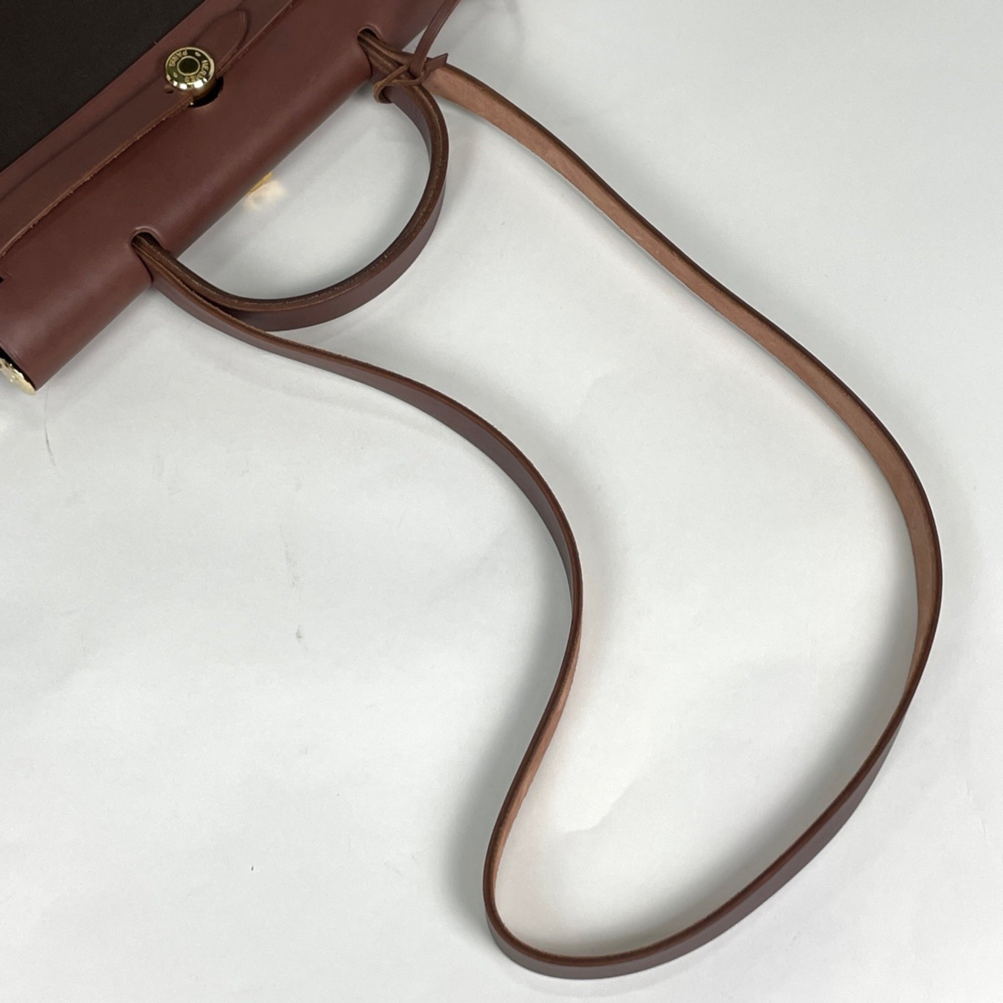 Hermes Her Bag Havane Toile Officier Toile H Vache Leather Handbag (Pre-Owned)
