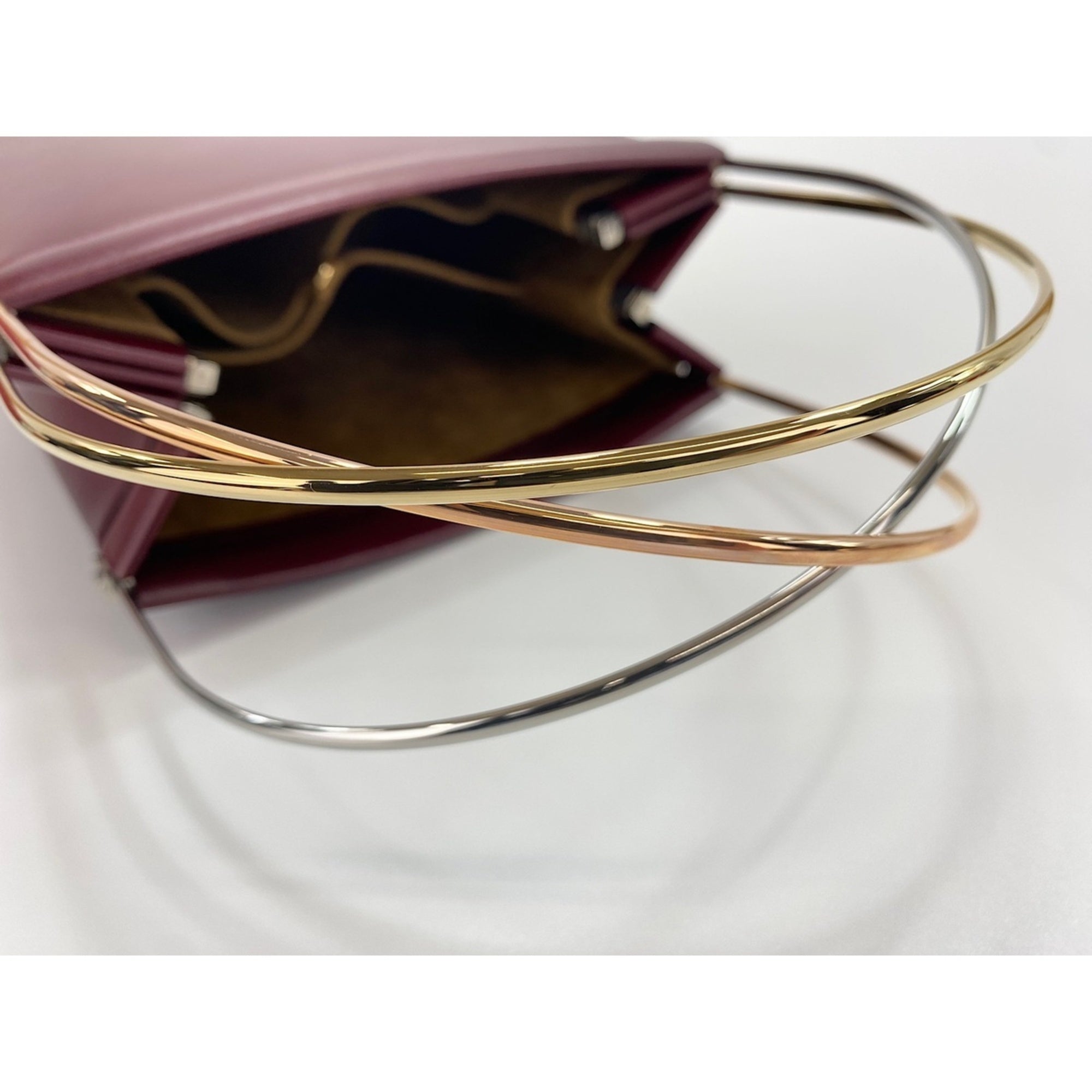 Cartier Trinity Wine Red Handbag (Pre-Owned)