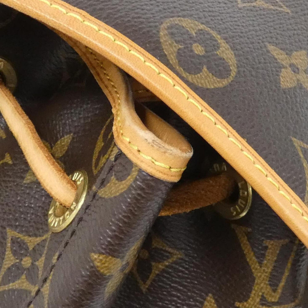 Louis Vuitton Brown Coated Canvas Backpack (Pre-Owned)
