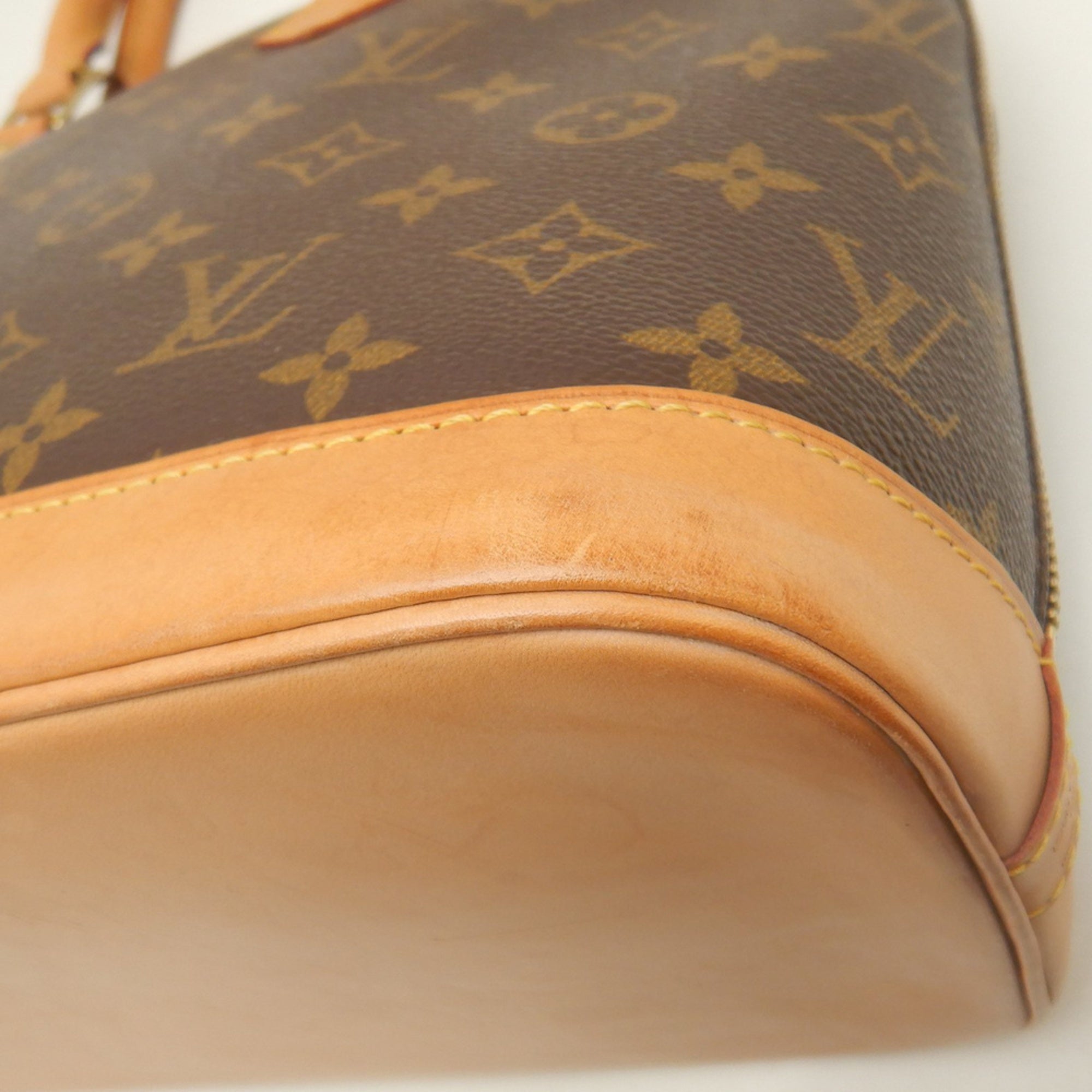 Louis Vuitton Brown Monogram Canvas Handbag (Pre-Owned)