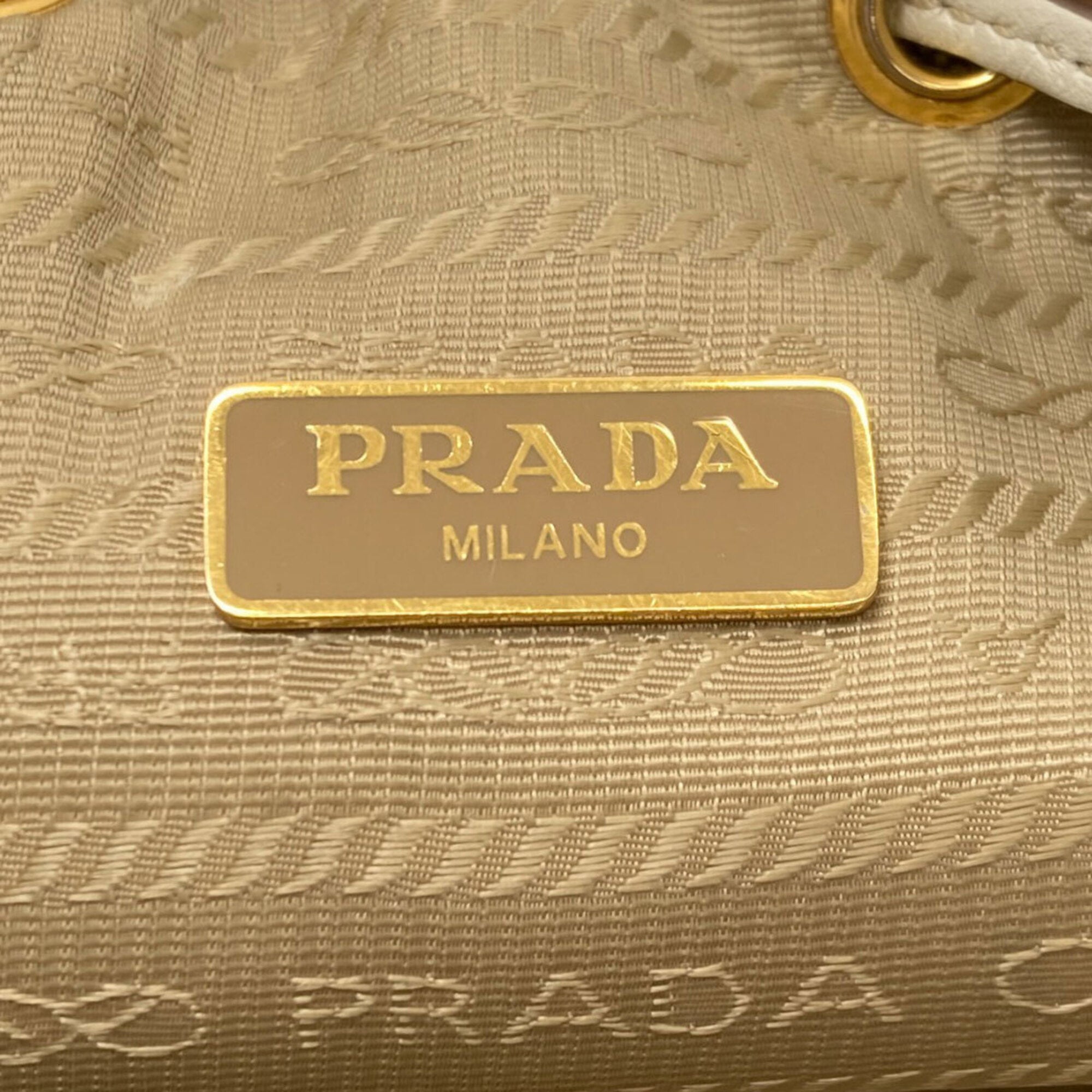 Prada Brown White Canvas Handbag (Pre-Owned)