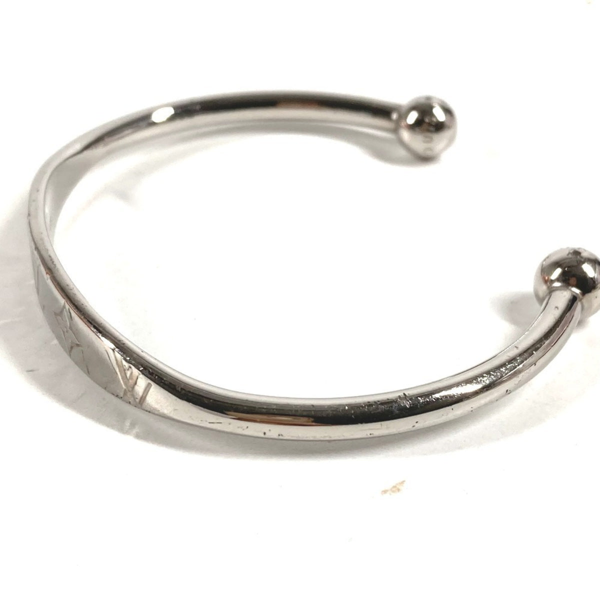 Louis Vuitton Silver Metal Charm Bracelet (Pre-Owned)