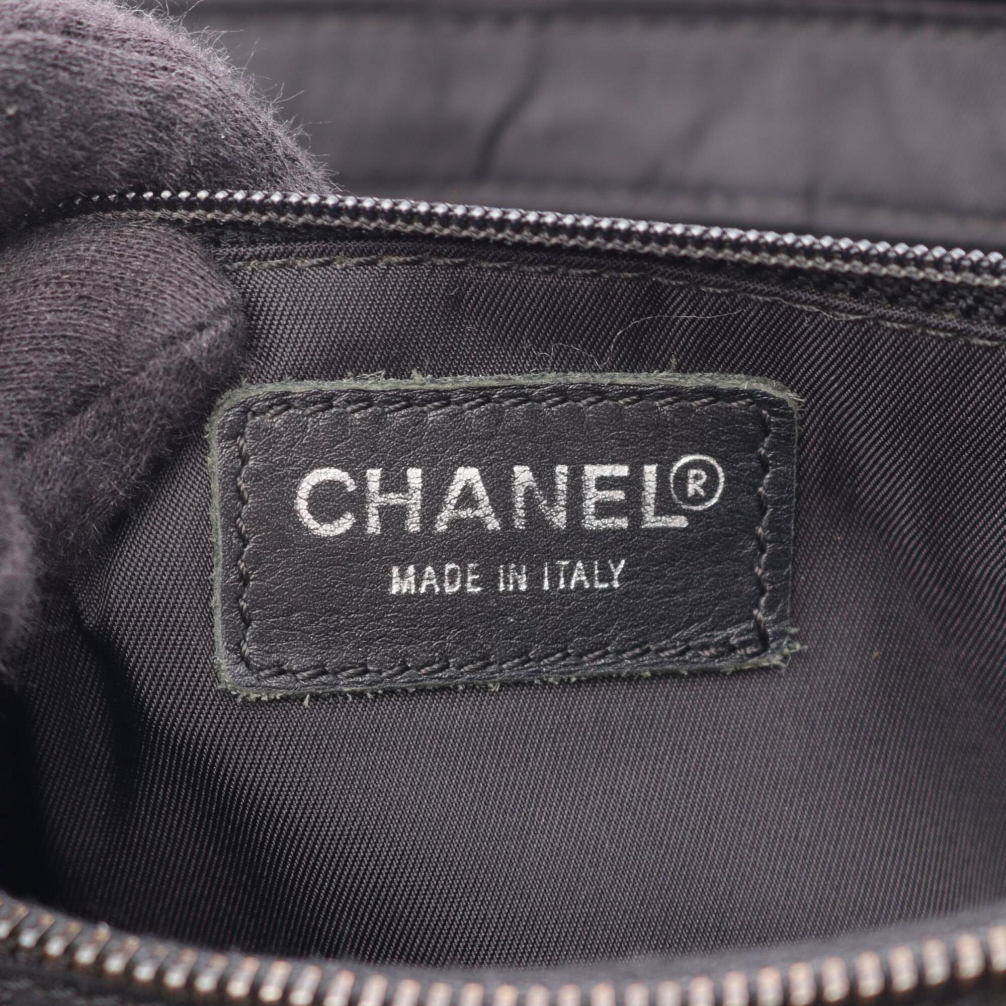 Chanel Black Leather Nylon Canvas Backpack Handbag (Pre-Owned)
