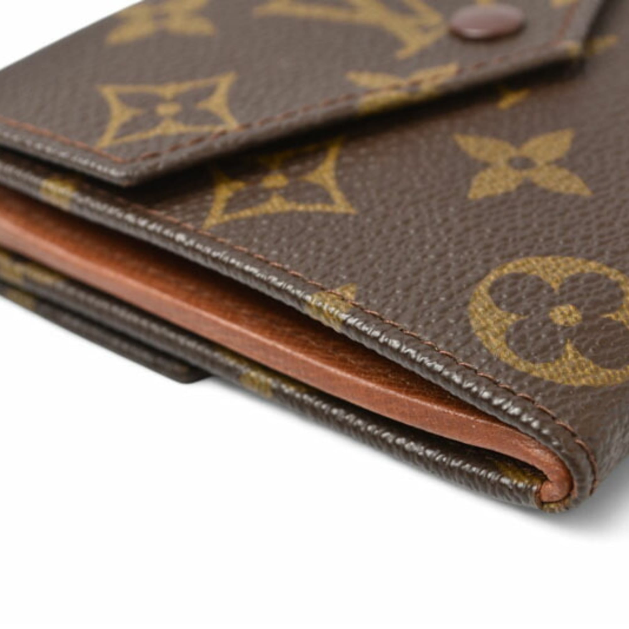 Louis Vuitton Brown Coated Canvas Wallet (Bi-Fold) (Pre-Owned)