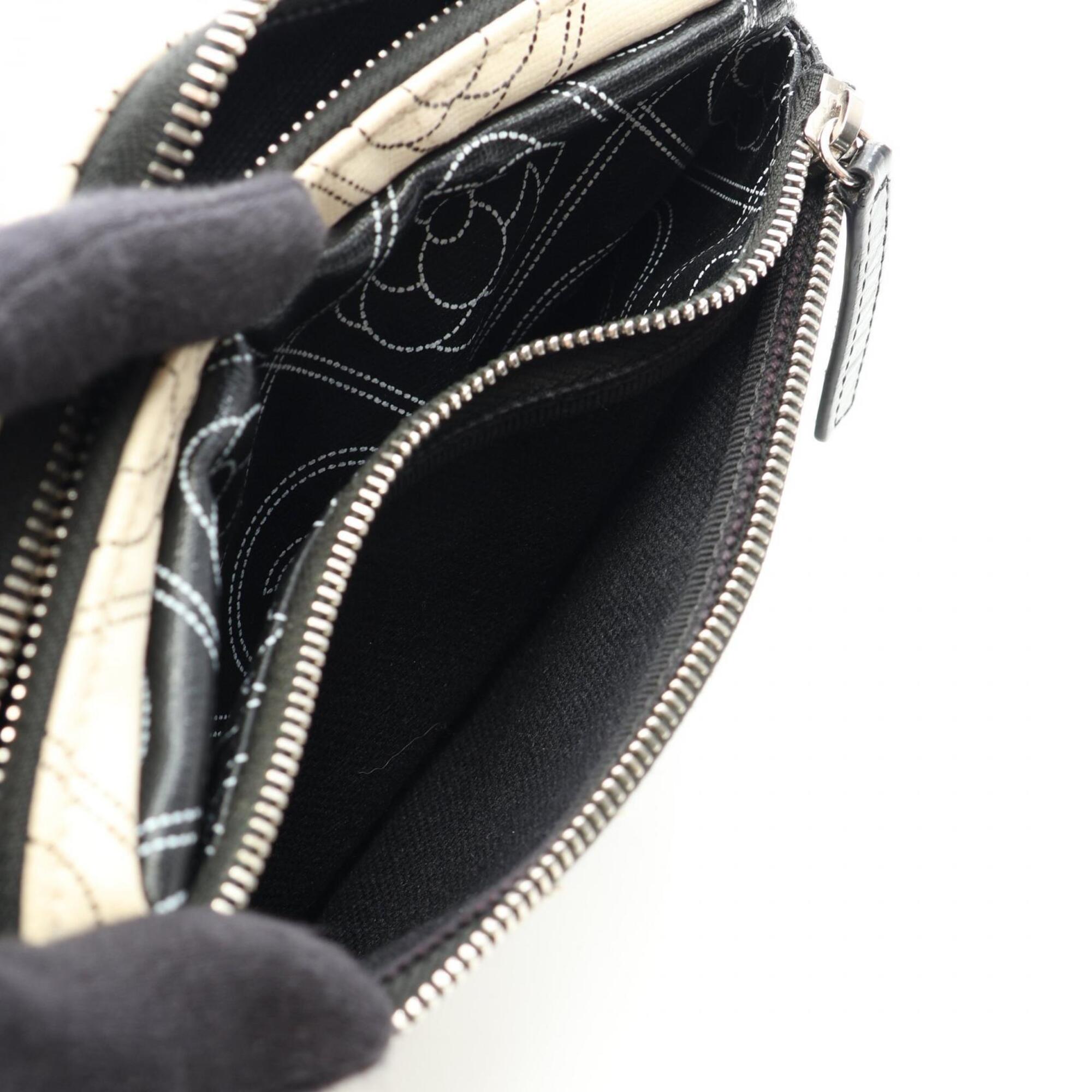 Chanel Black White Coated Canvas Pouch (Pre-Owned)