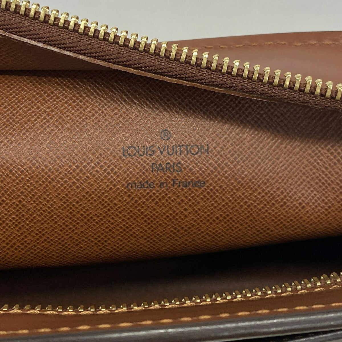 Louis Vuitton Brown Clutch Bag (Pre-Owned)