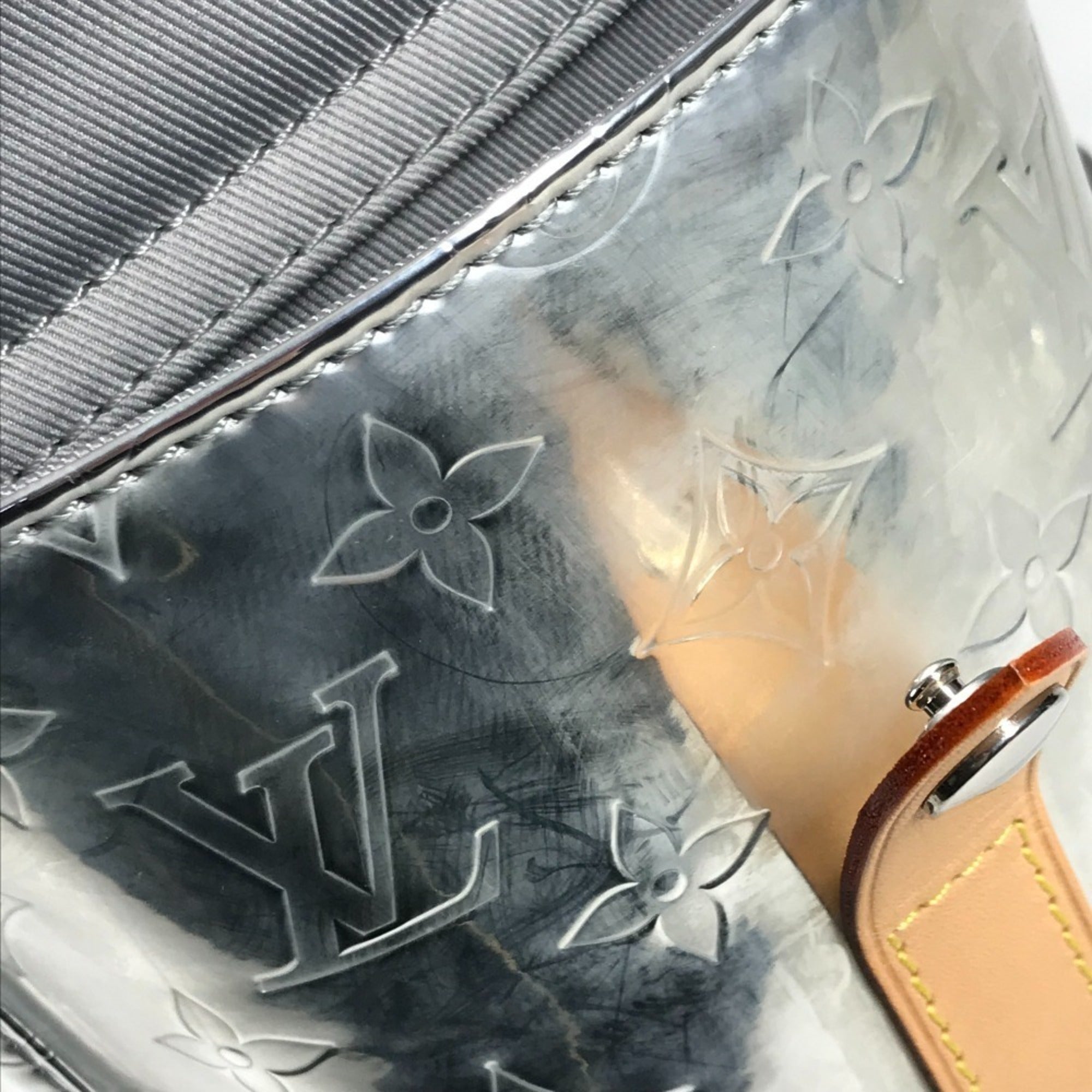 Louis Vuitton Silver Leather Backpack (Pre-Owned)