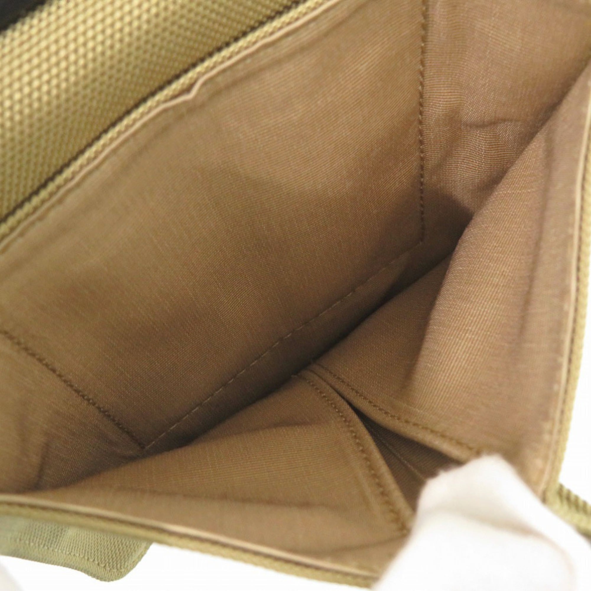 Yves Saint Laurent Beige Black Canvas Leather Shoulder Bag (Pre-Owned)
