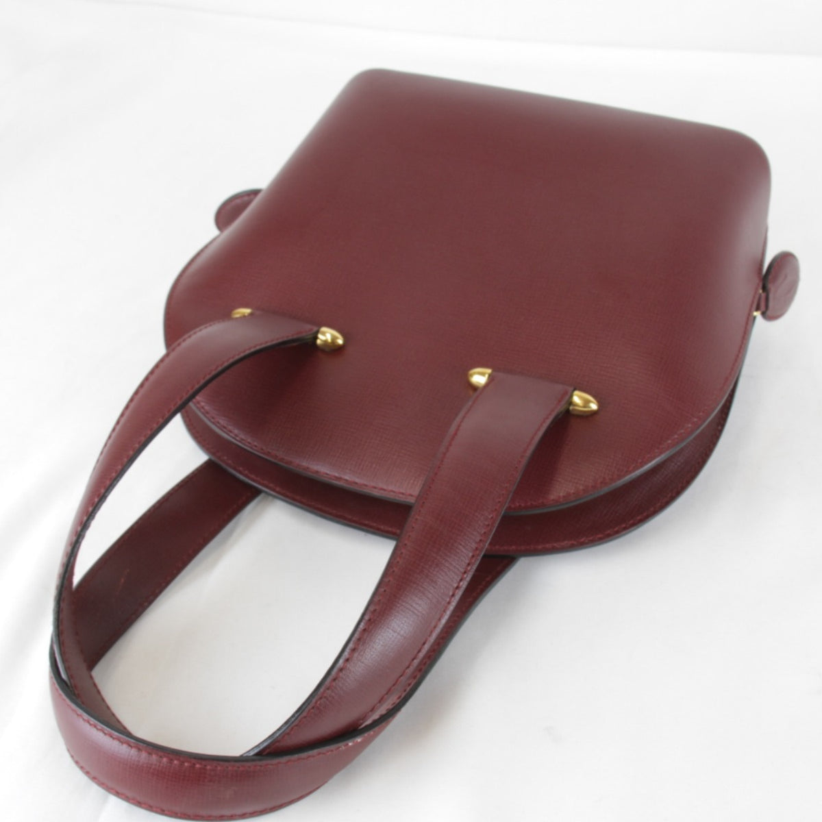 Cartier Must Wine Red Leather Handbag (Pre-Owned)