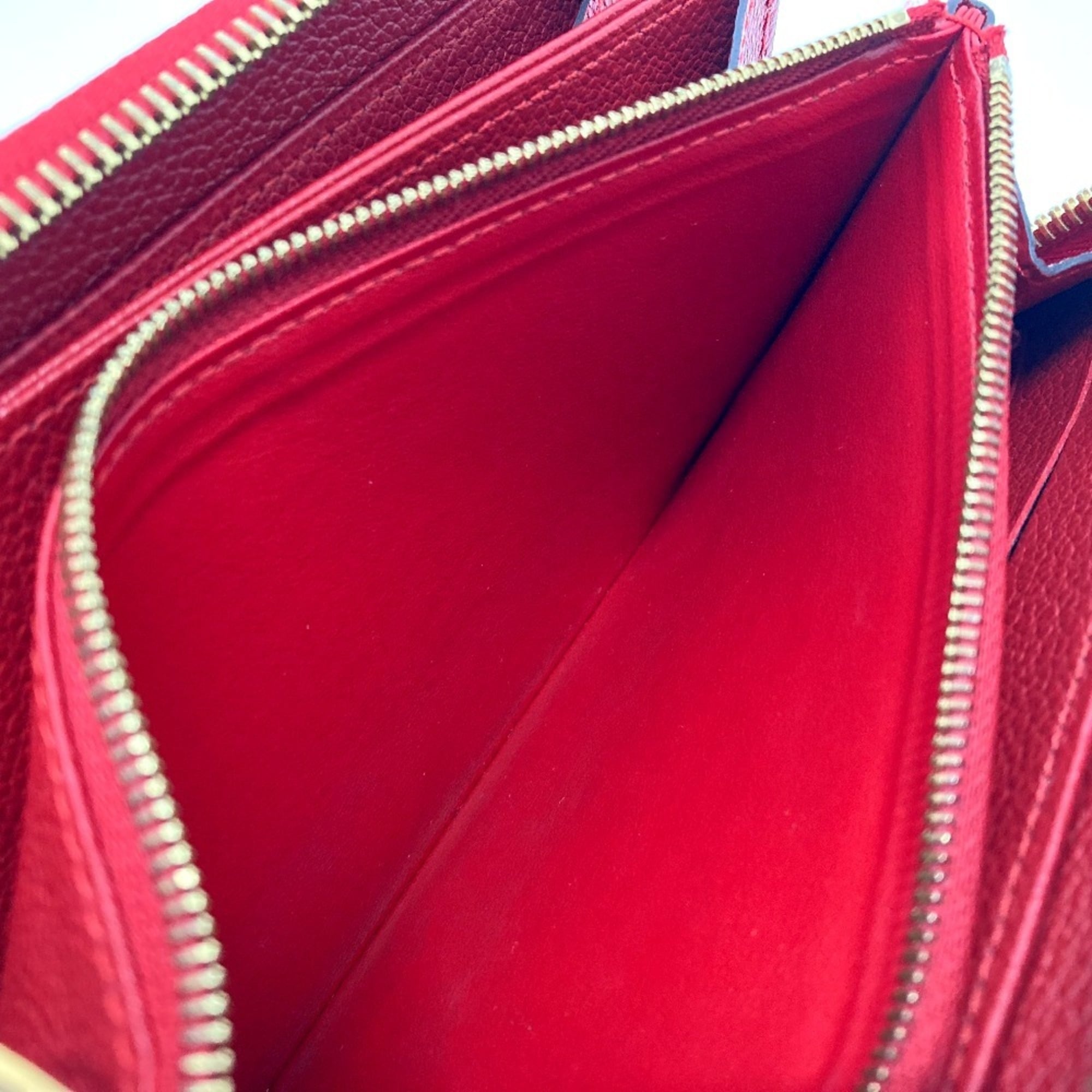Louis Vuitton Monogram Empreinte Cerise Red Color Monogram Empreinte Long Wallet (Bi-Fold) (Pre-Owned)