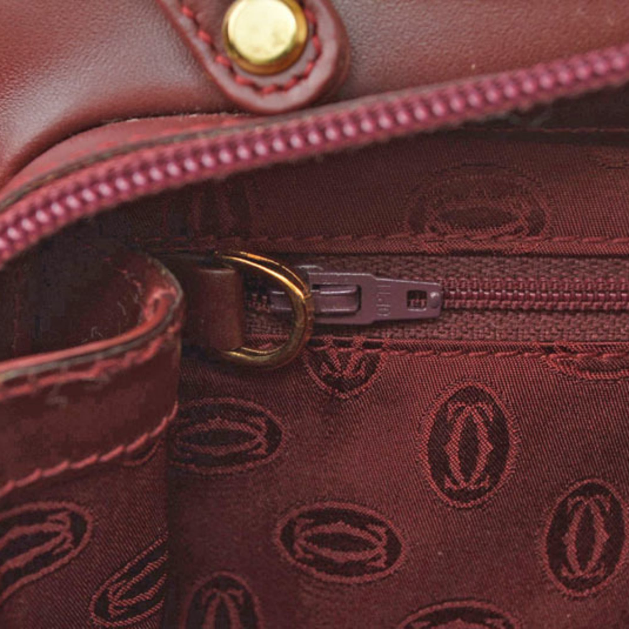 Cartier Must Bordeaux Clutch Bag (Pre-Owned)