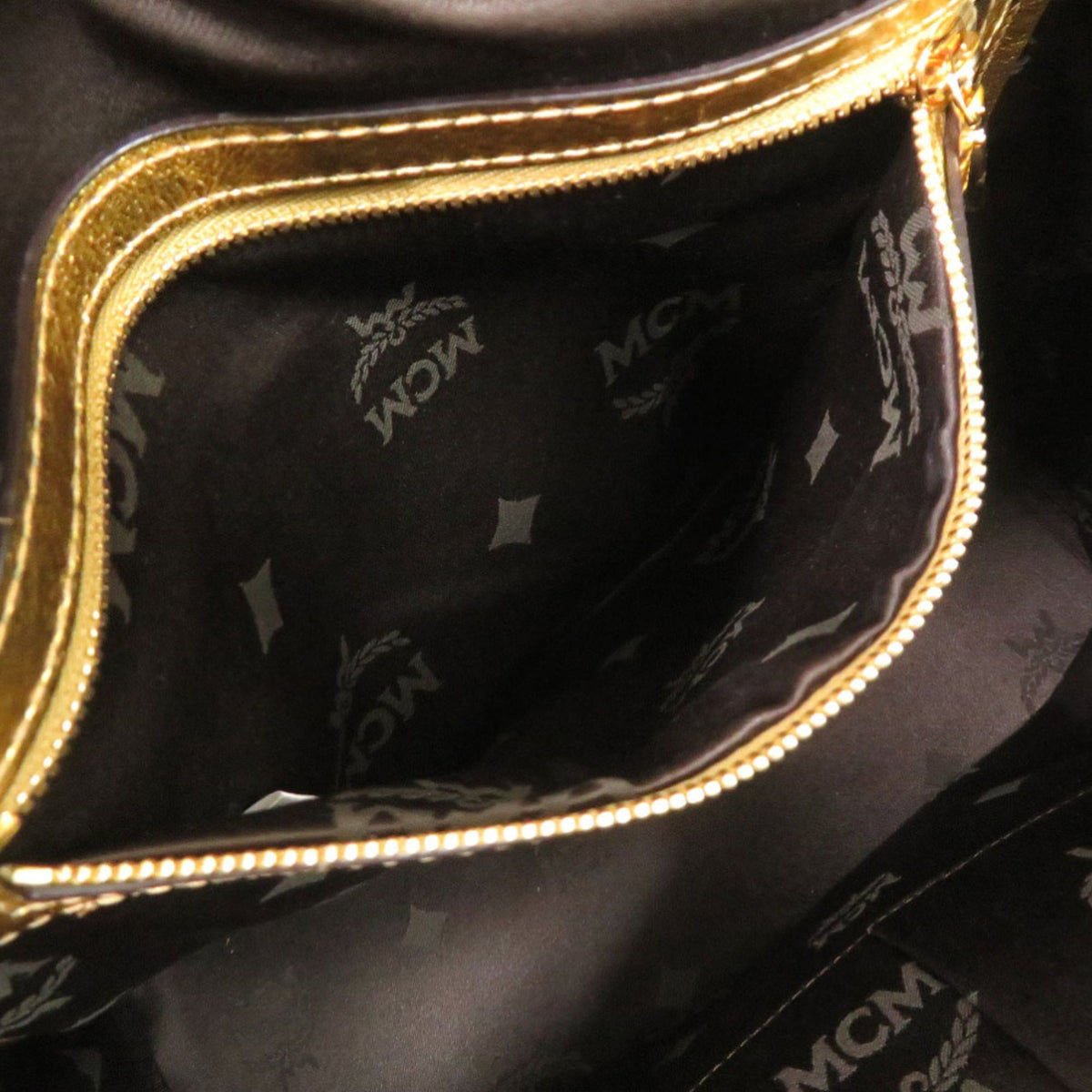 Mcm Gold Leather Backpack (Pre-Owned)
