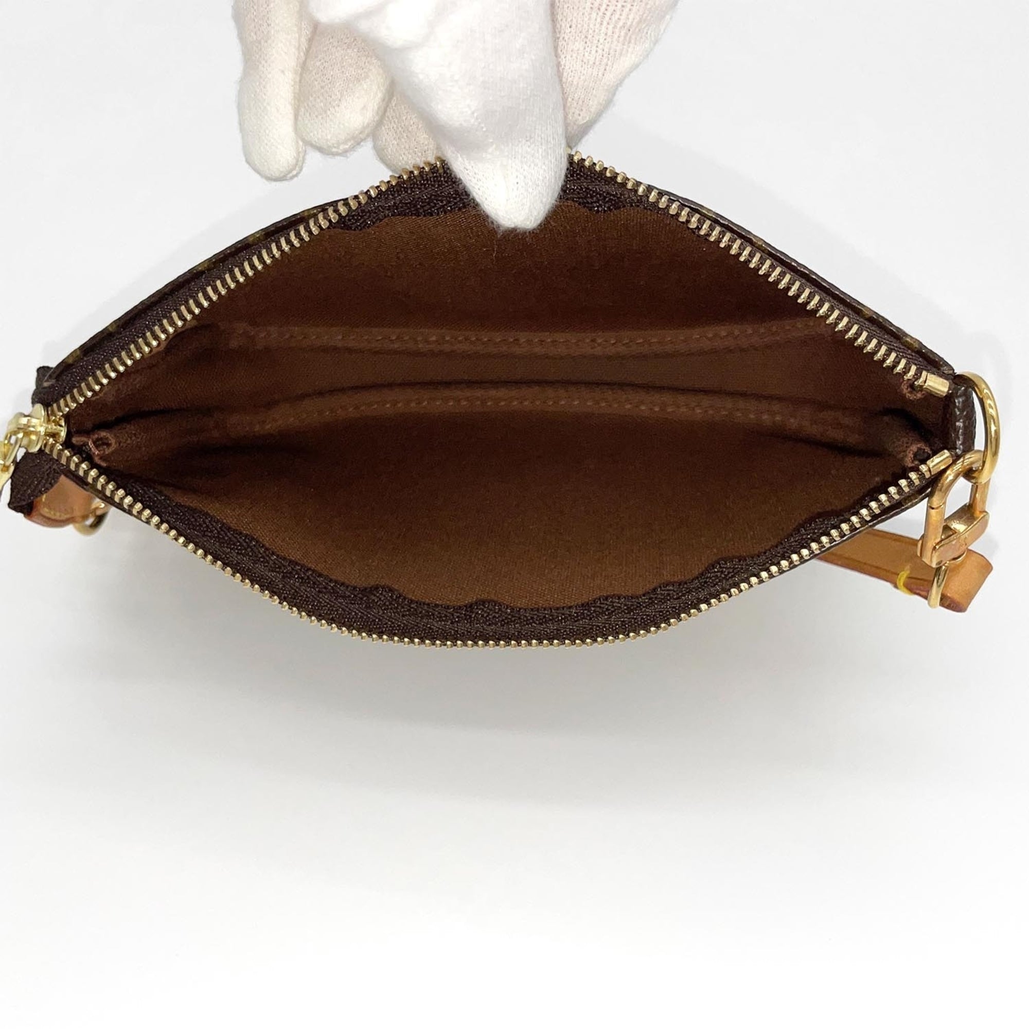 Louis Vuitton Brown Coated Canvas Pvc Handbag (Pre-Owned)