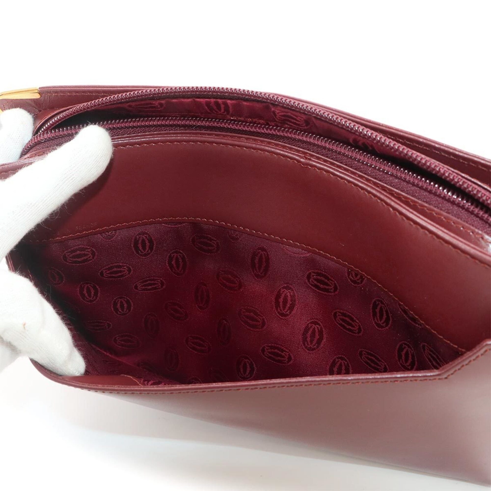 Cartier Bordeaux Leather Clutch Bag Handbag (Pre-Owned)