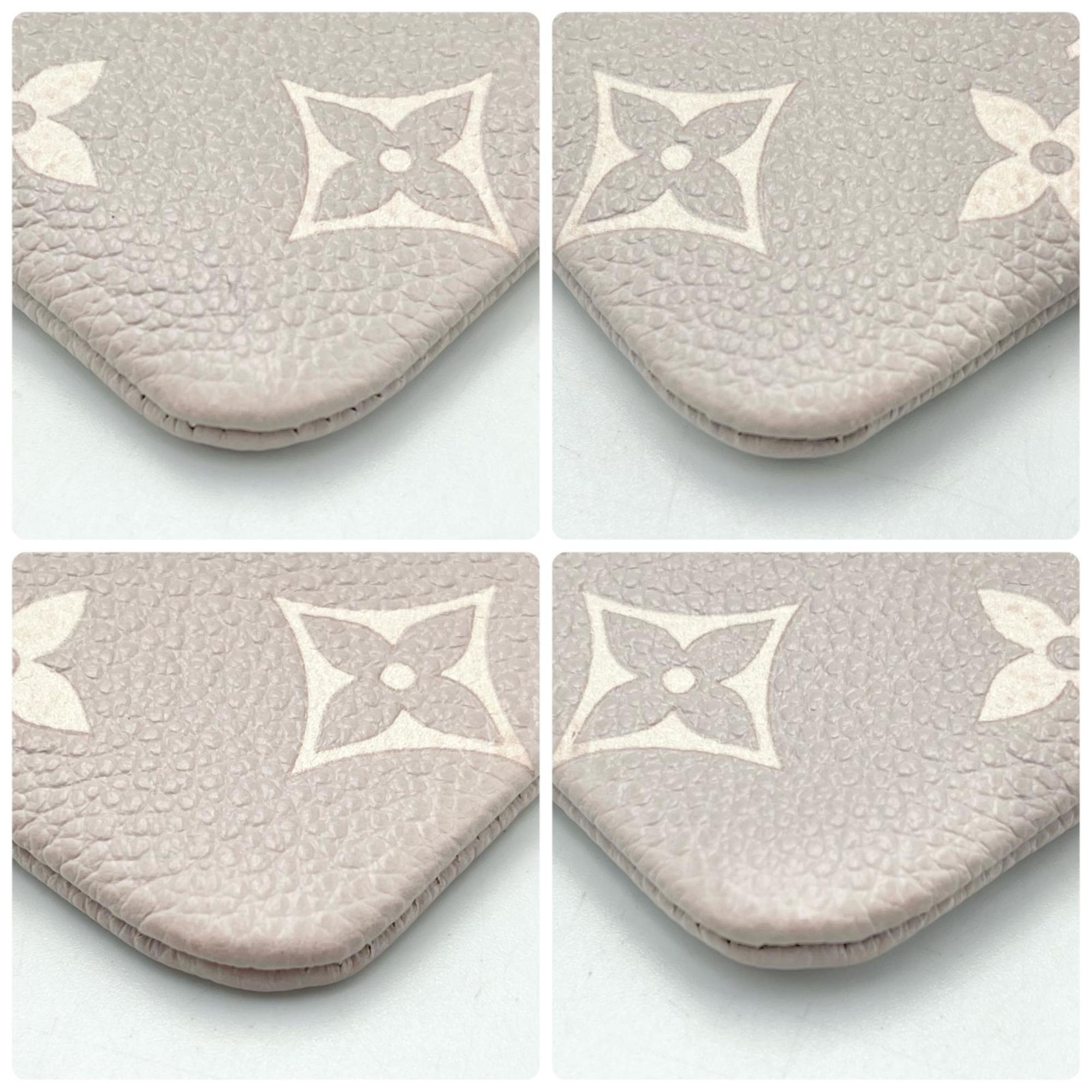Louis Vuitton Grayish Monogram Empreinte Pochette (Pre-Owned)