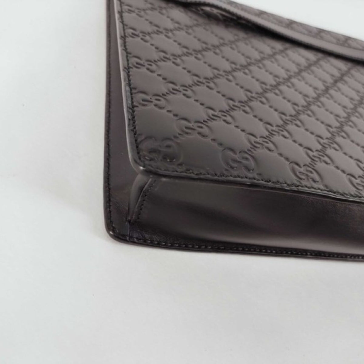 Gucci Guccissima Black Leather Clutch Bag (Pre-Owned)