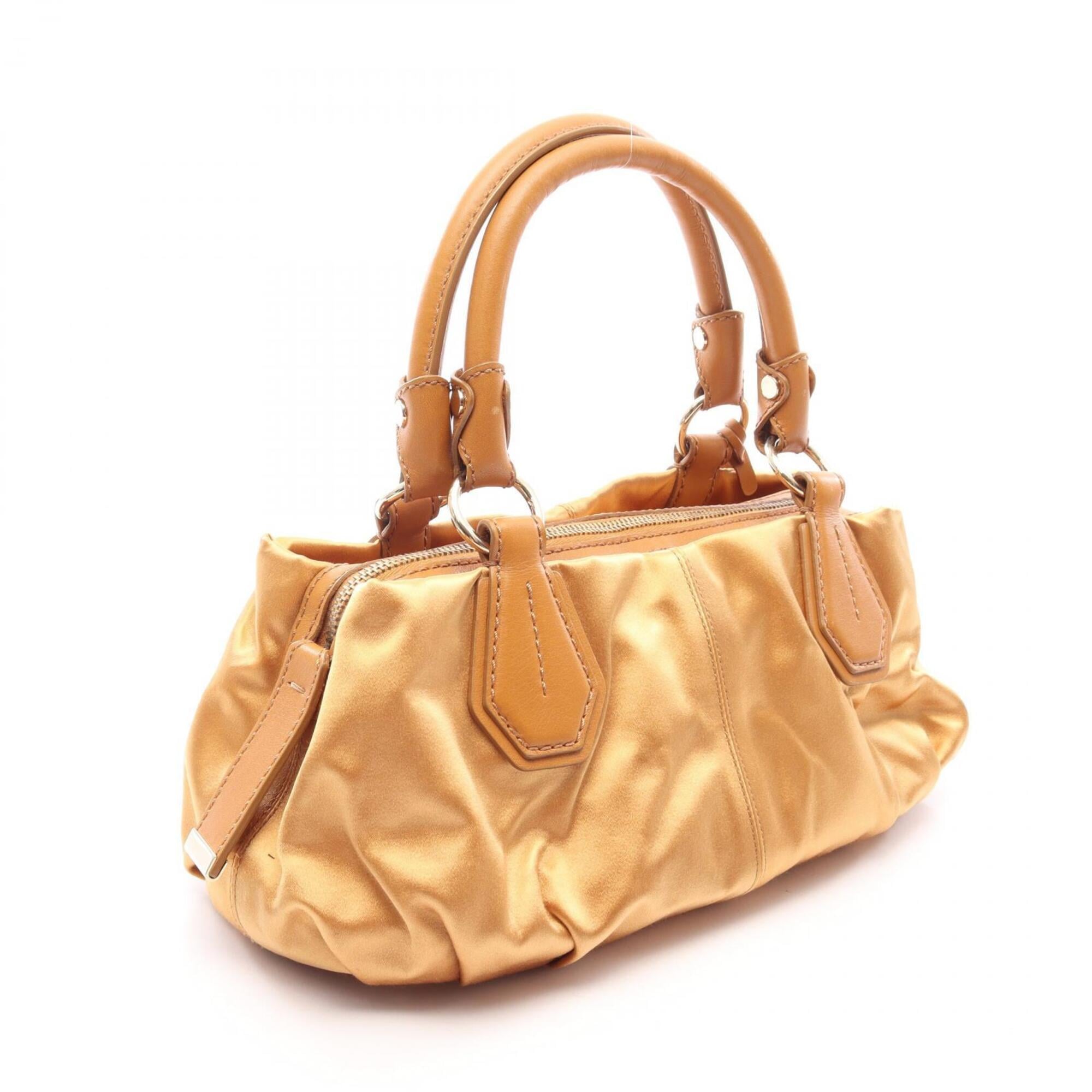 Tod's Brown Fabric Leather Handbag (Pre-Owned)