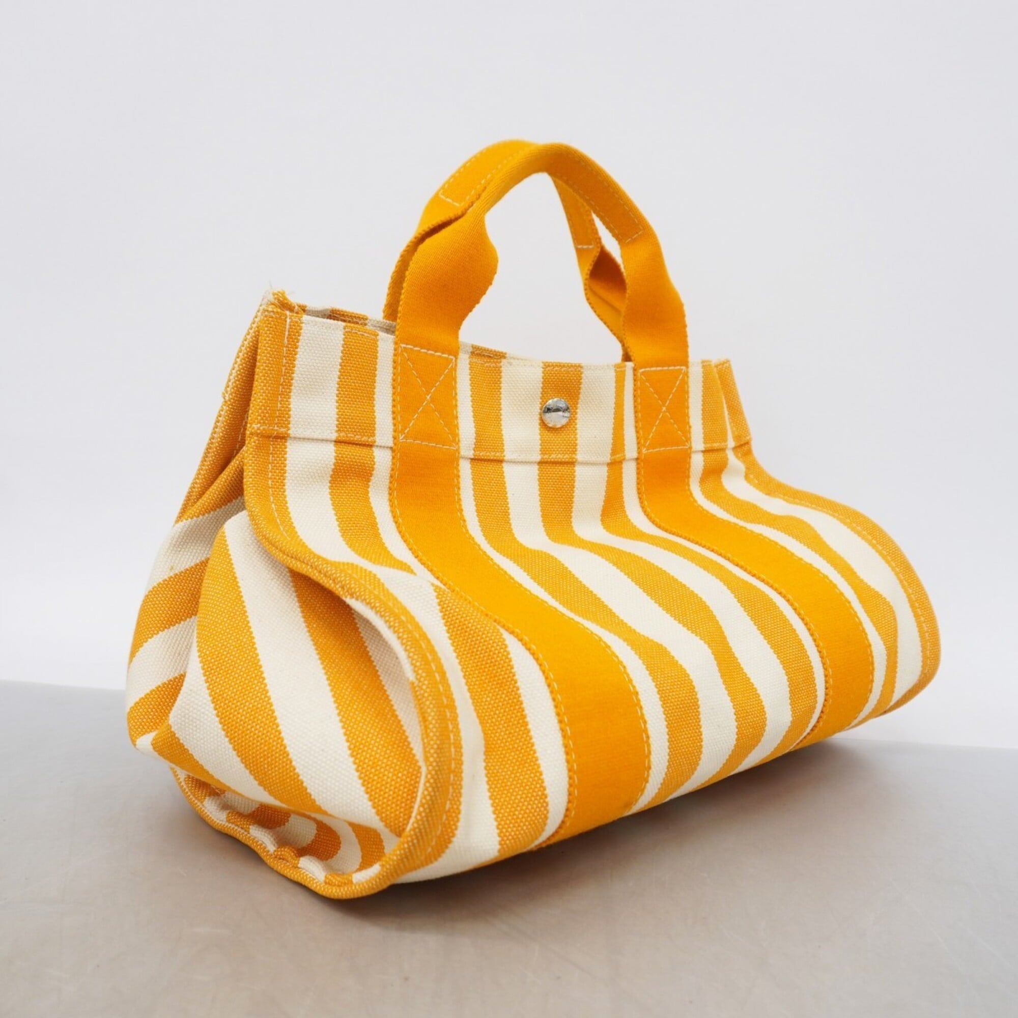 Hermes Orange Canvas Handbag (Pre-Owned)