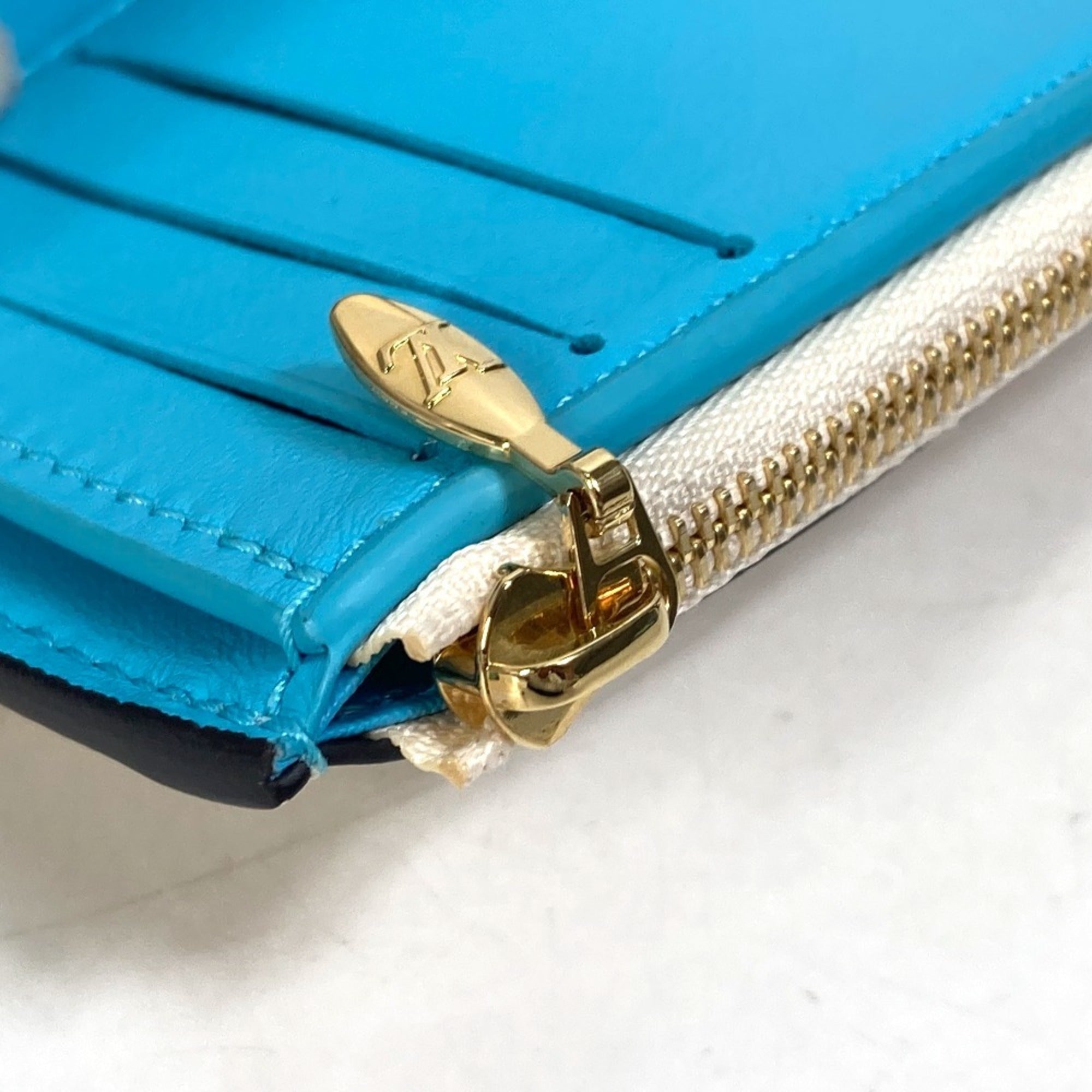 Louis Vuitton White Leather Wallet (Tri-Fold) (Pre-Owned)