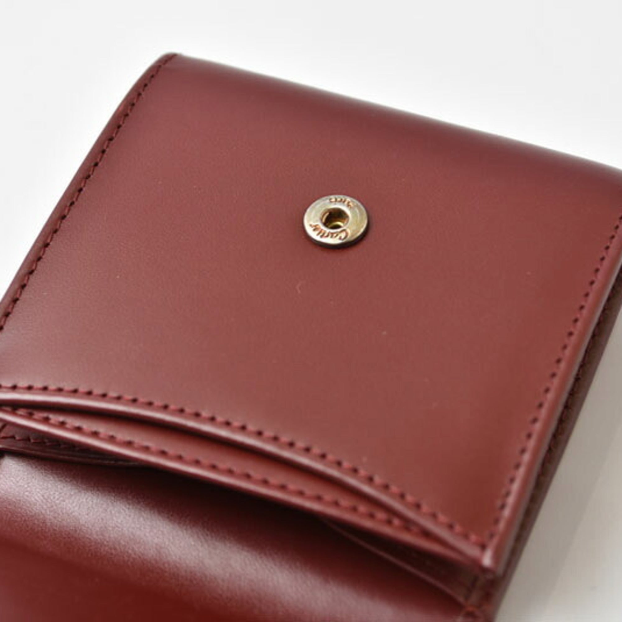 Cartier Bordeaux Leather Coin Purse/Coin Case (Pre-Owned)