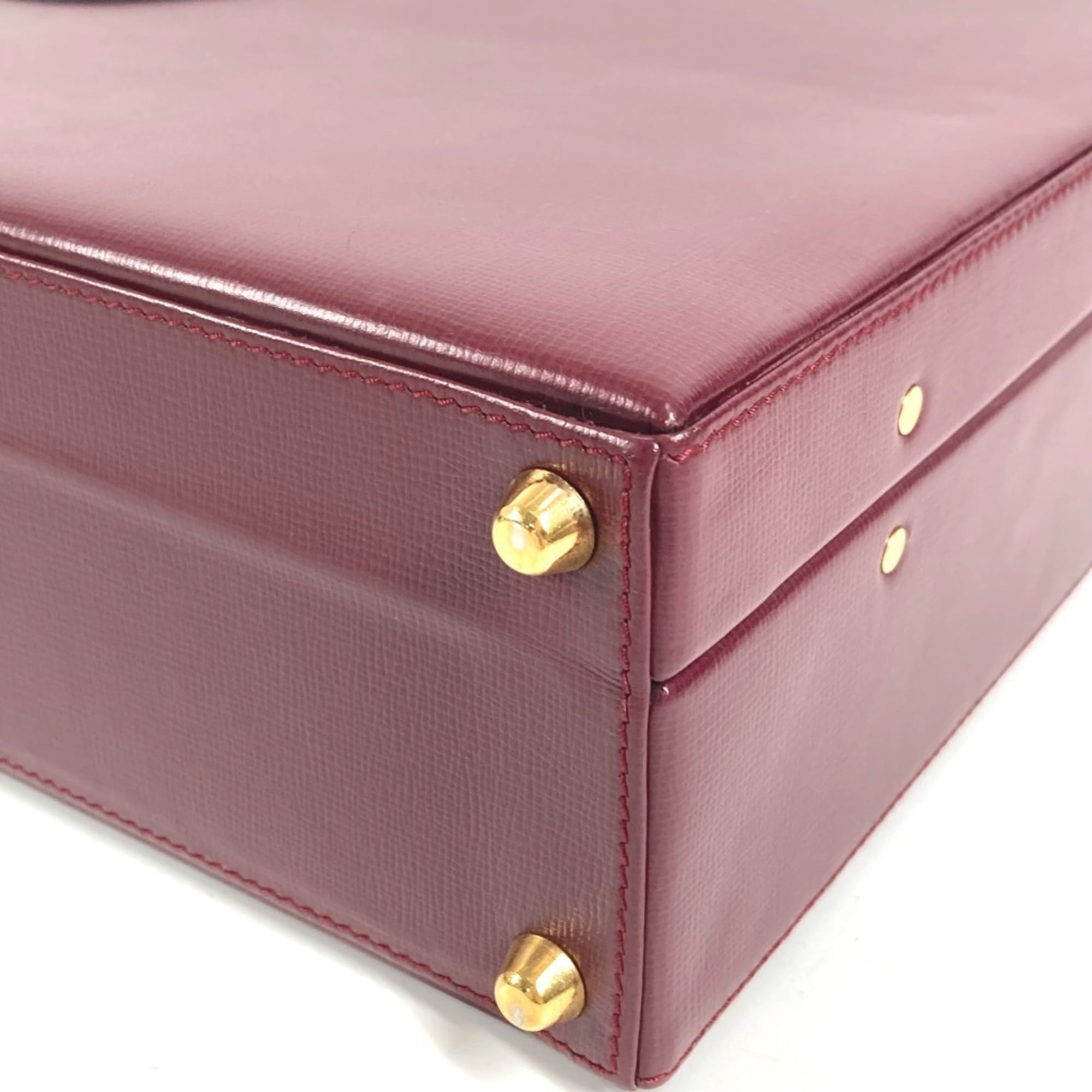 Cartier Wine Red Leather Handbag (Pre-Owned)
