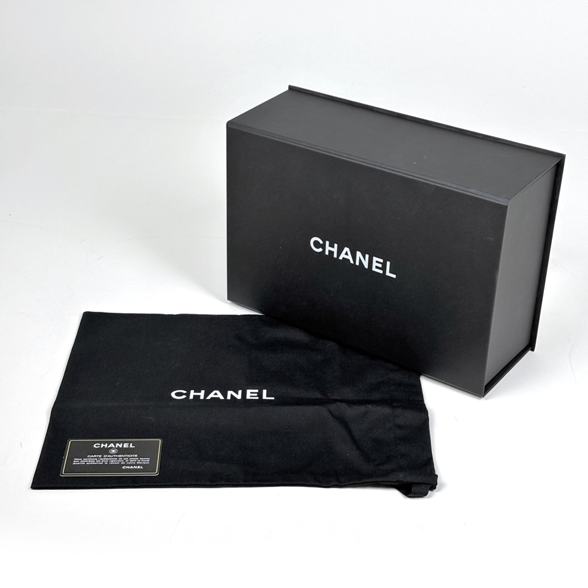Chanel Black Grained Calfskin Sling Bag (Pre-Owned)