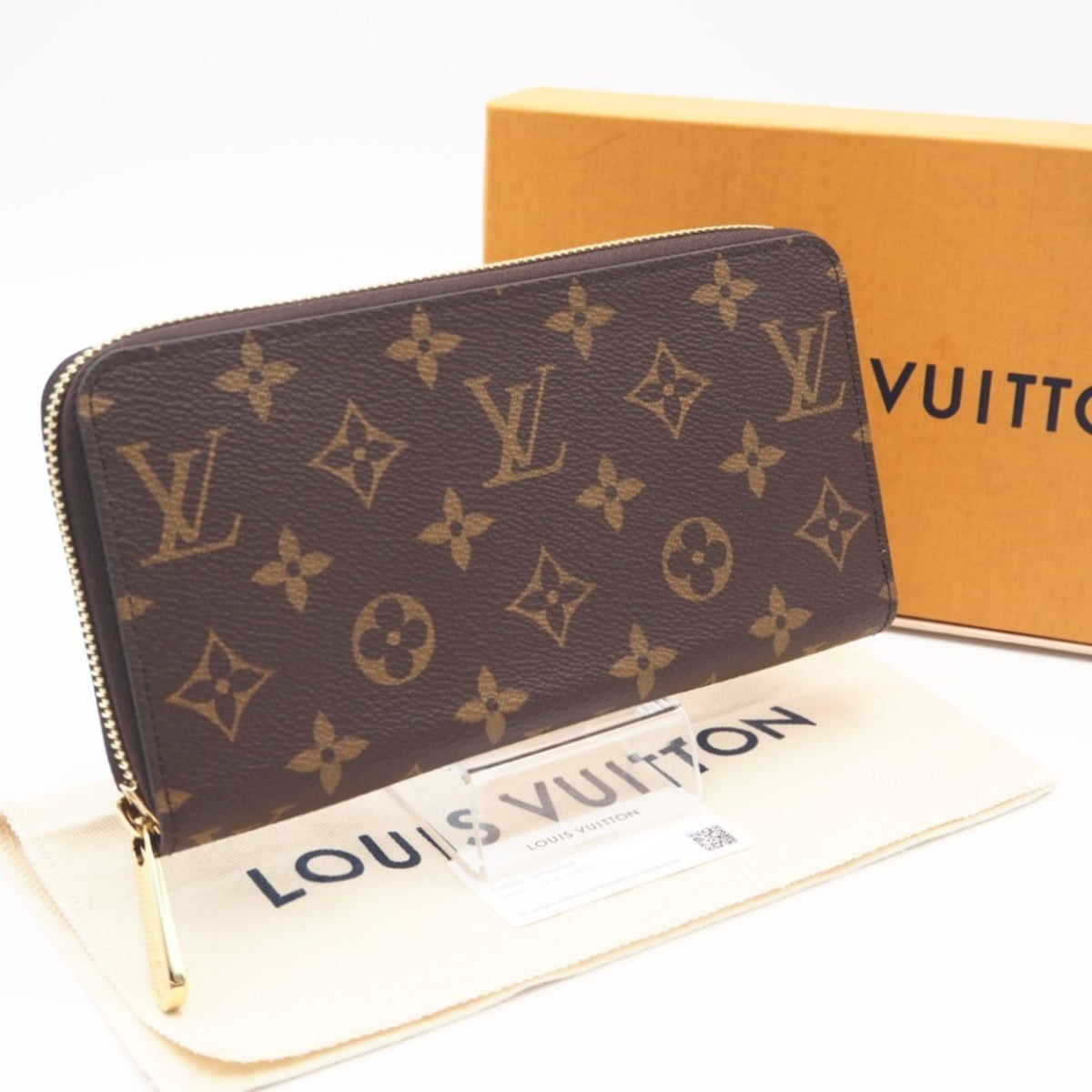 Louis Vuitton Brown Coated Canvas Long Wallet (Bi-Fold) (Pre-Owned)