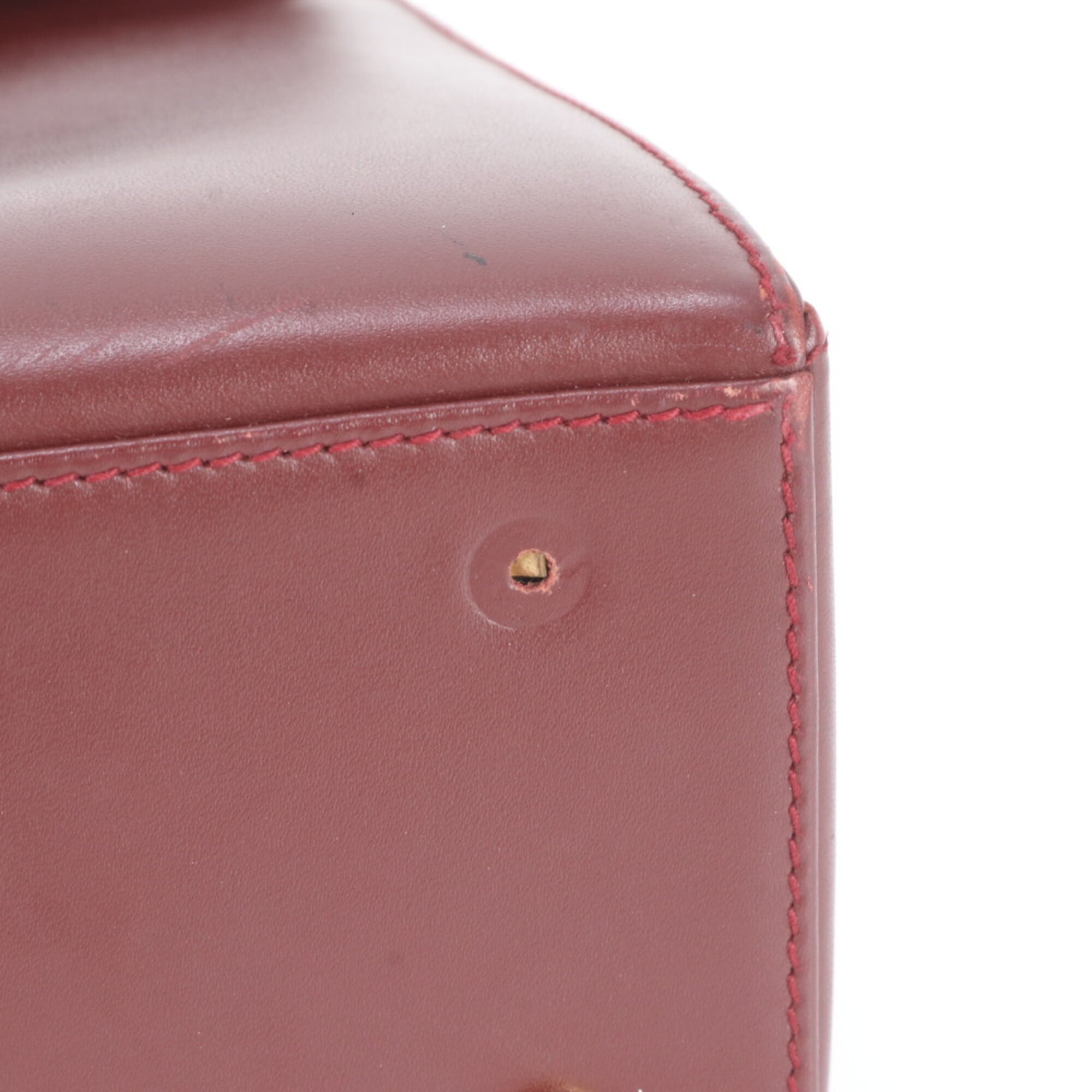Cartier Wine Red Leather Handbag (Pre-Owned)