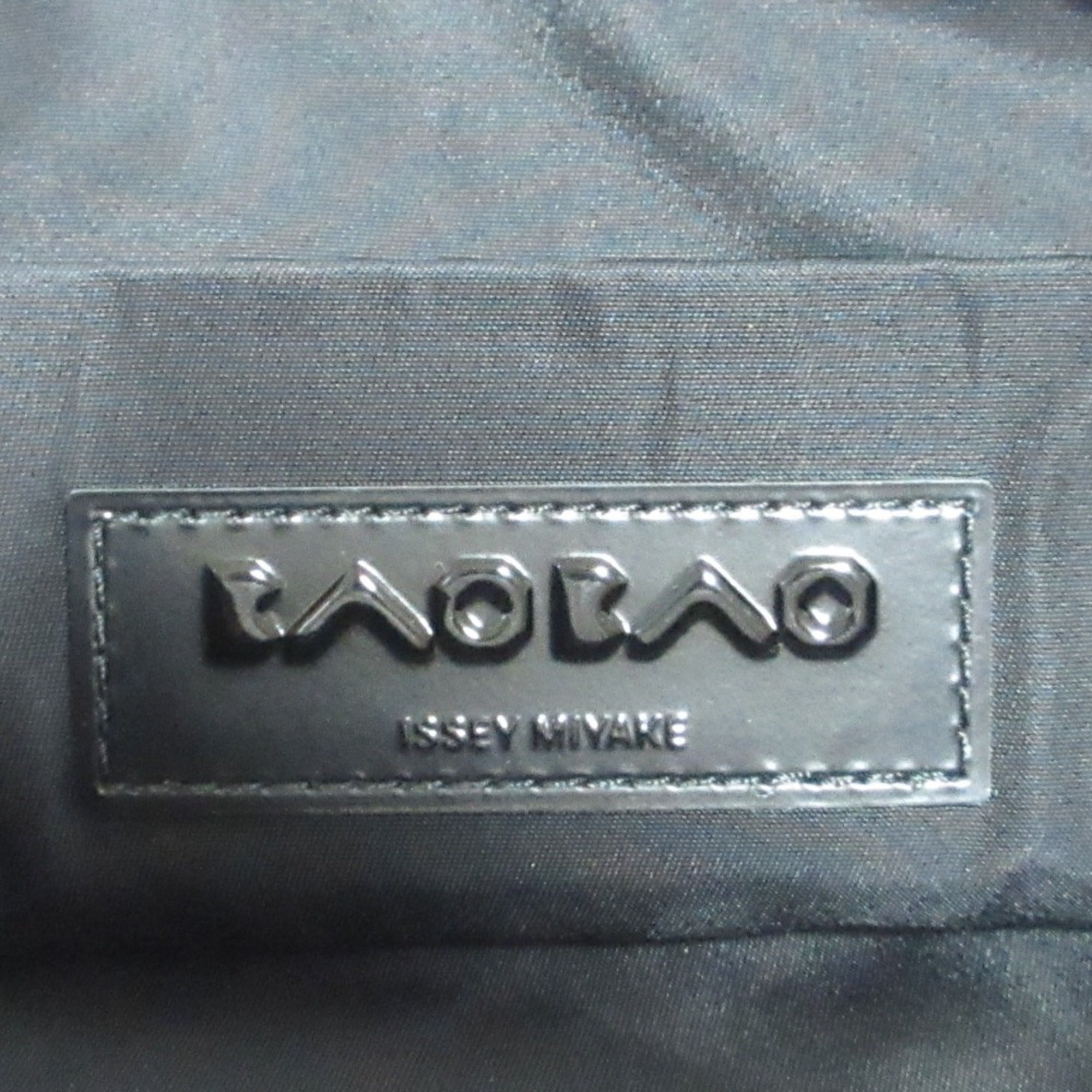 Issey Miyake Gray Nylon Polyester Elastane Brass Clutch Bag (Pre-Owned)