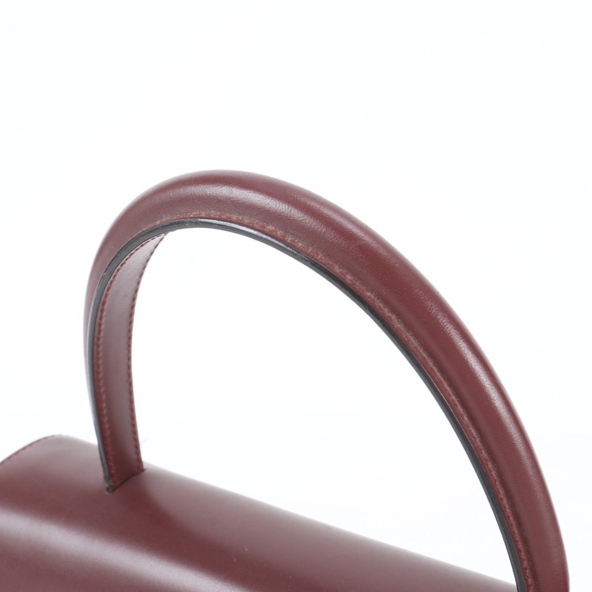 Cartier Wine Red Leather Handbag (Pre-Owned)
