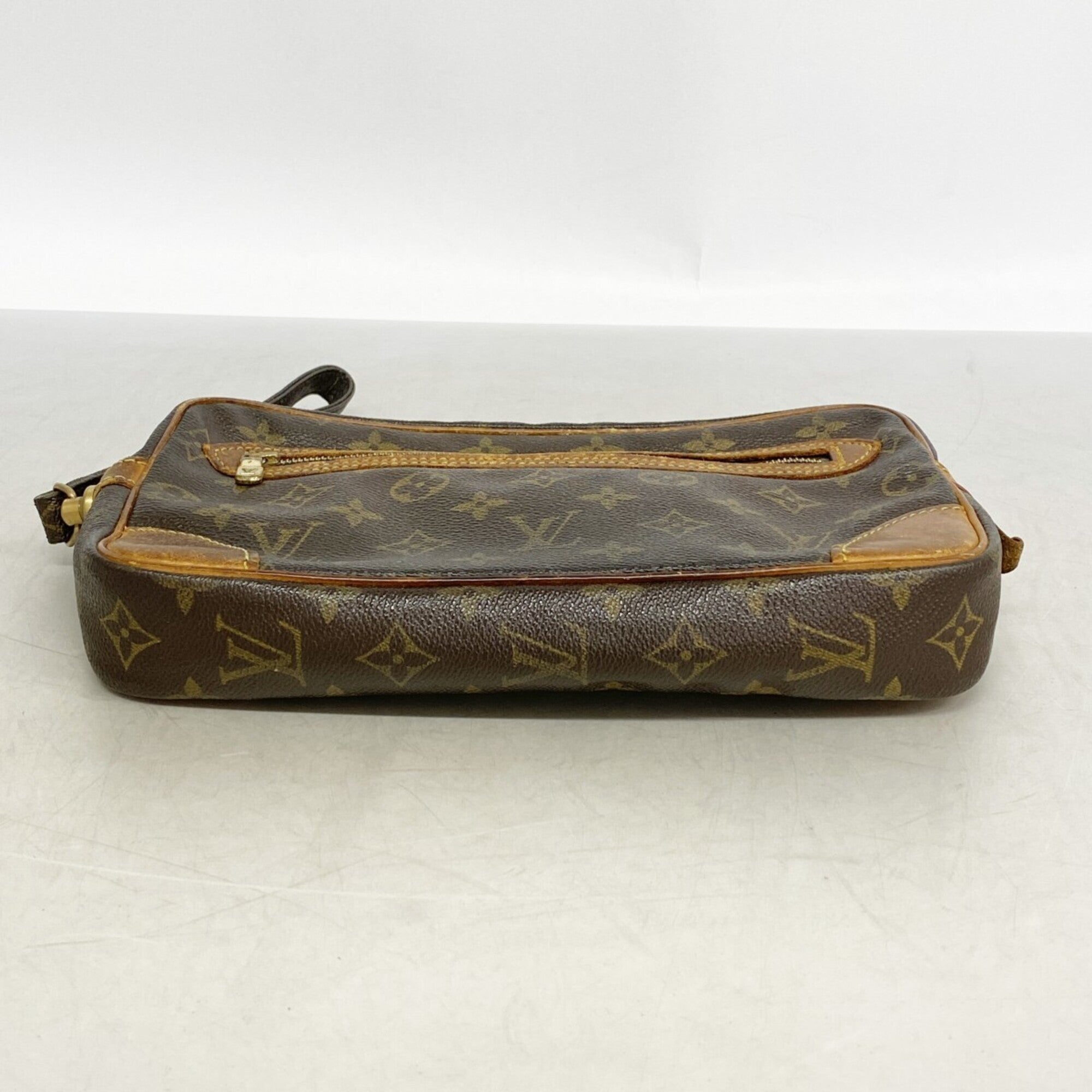 Louis Vuitton Brown Clutch Bag (Pre-Owned)