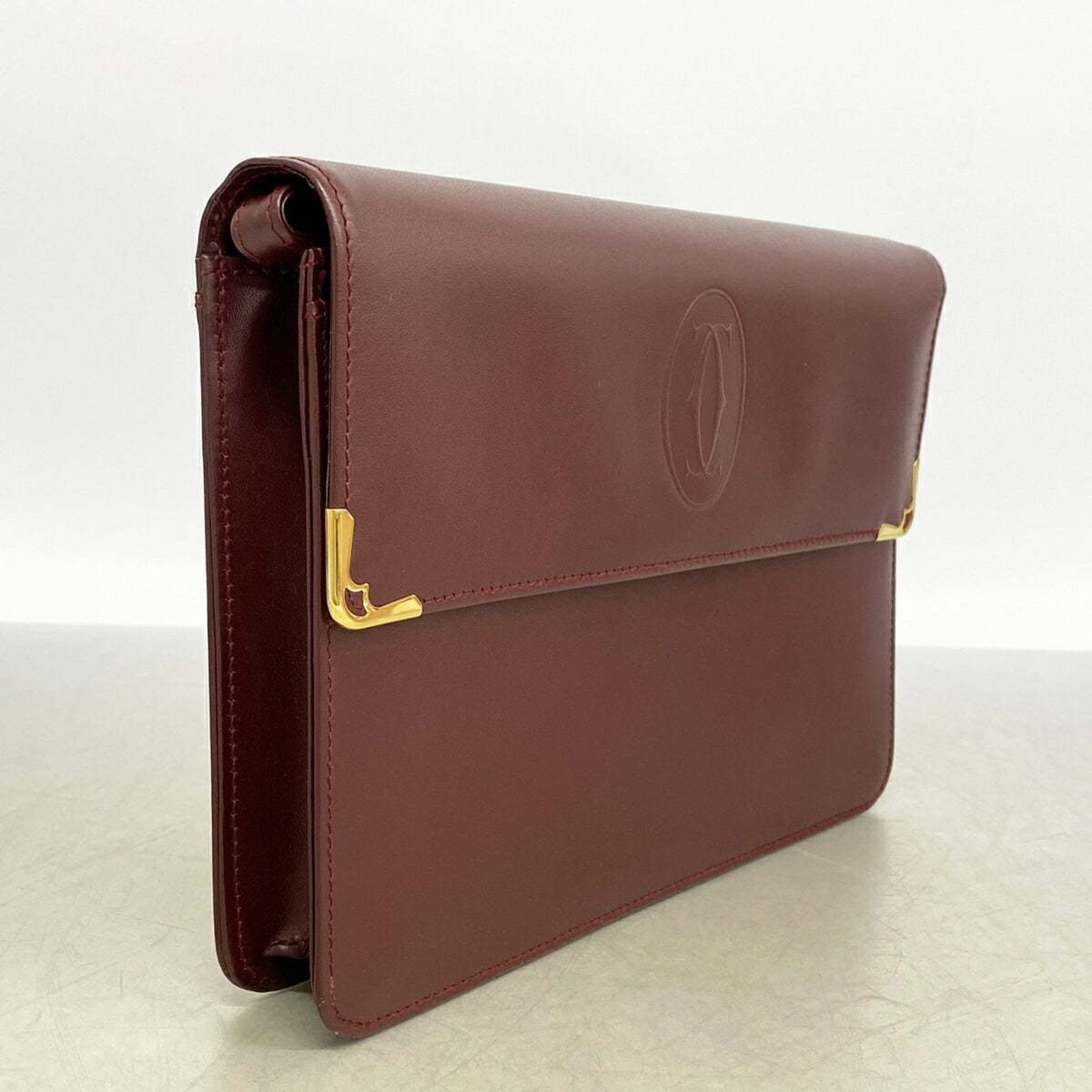 Cartier Bordeaux Leather Clutch Bag (Pre-Owned)