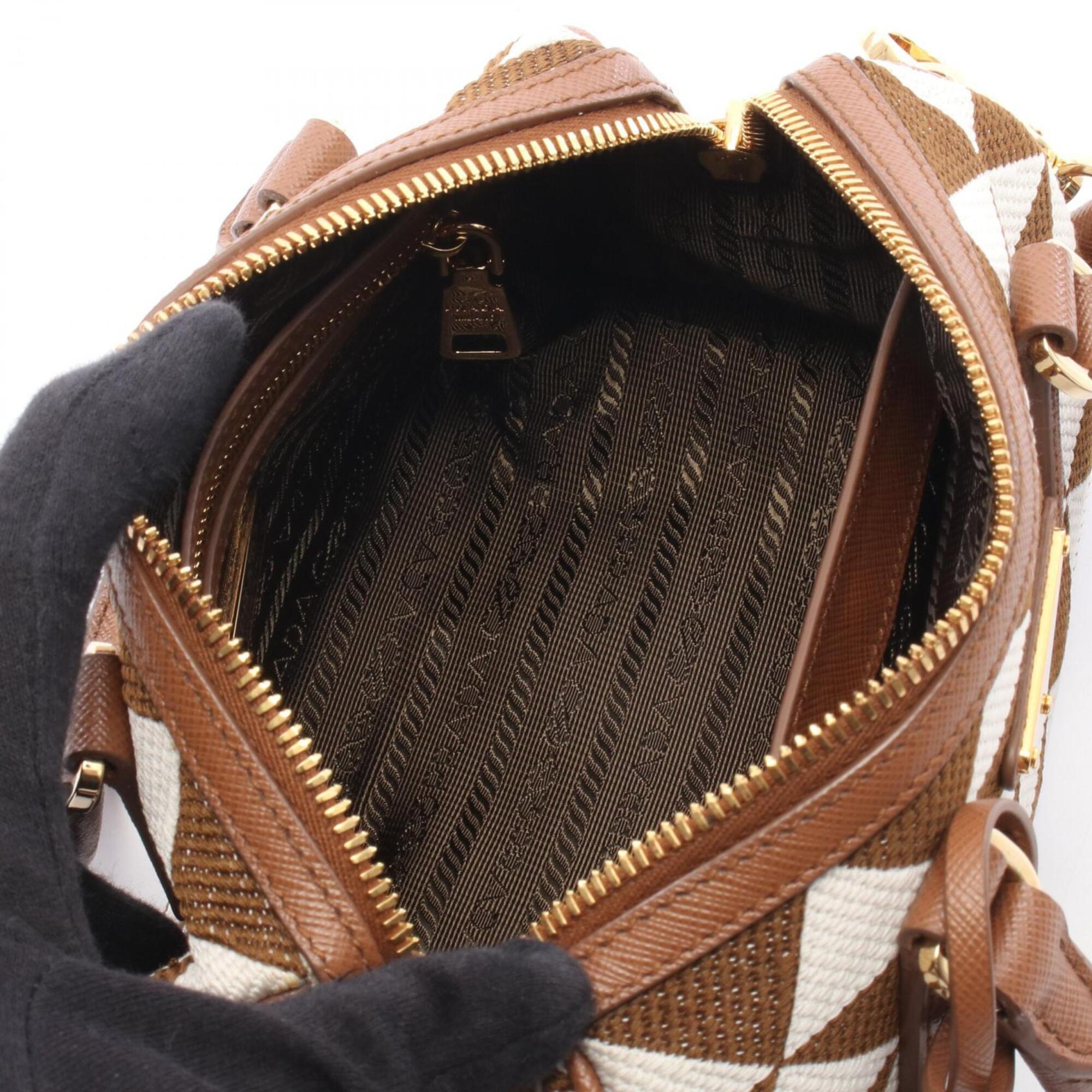 Prada Brown White Canvas Leather Handbag (Pre-Owned)