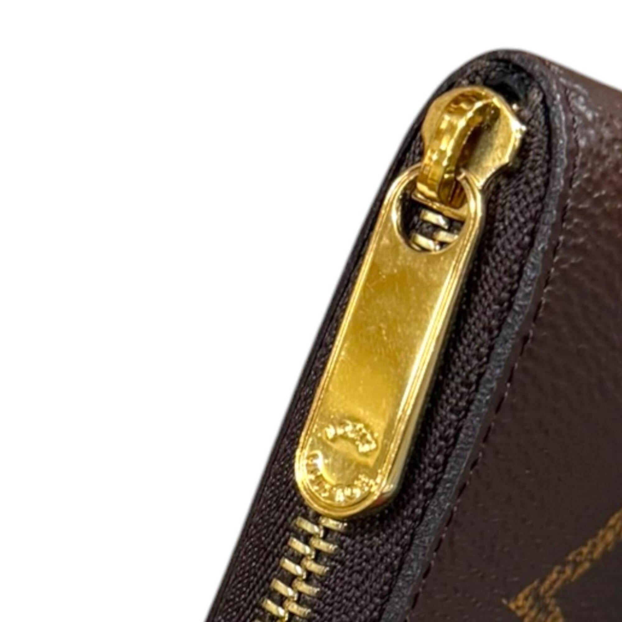 Louis Vuitton Brown Monogram Coin Purse/Coin Case (Pre-Owned)