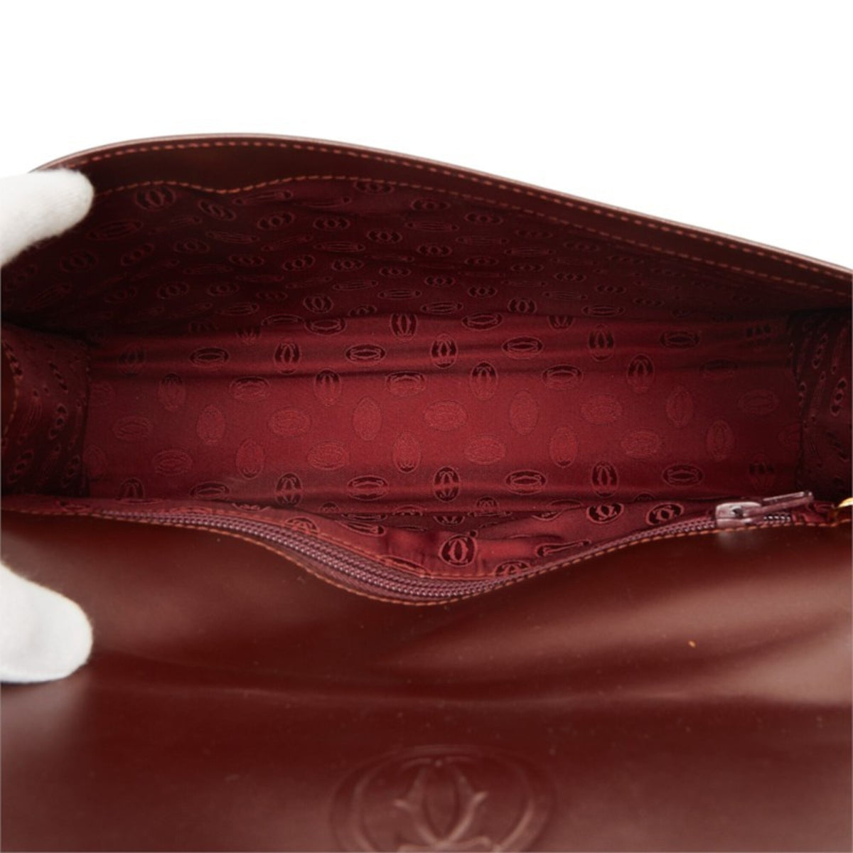 Cartier Must Wine Red Leather Handbag (Pre-Owned)