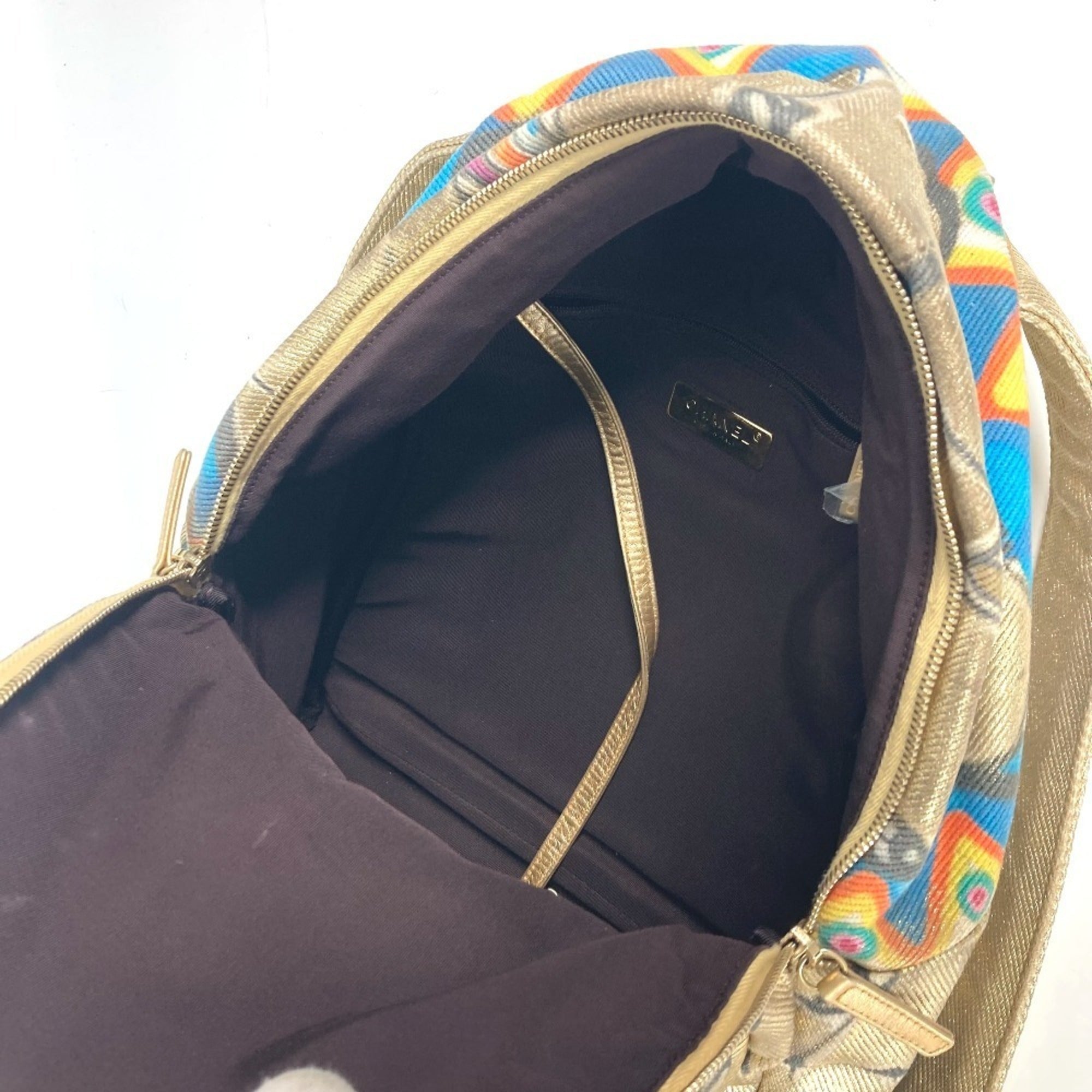 Chanel Gold Leather Canvas Backpack (Pre-Owned)