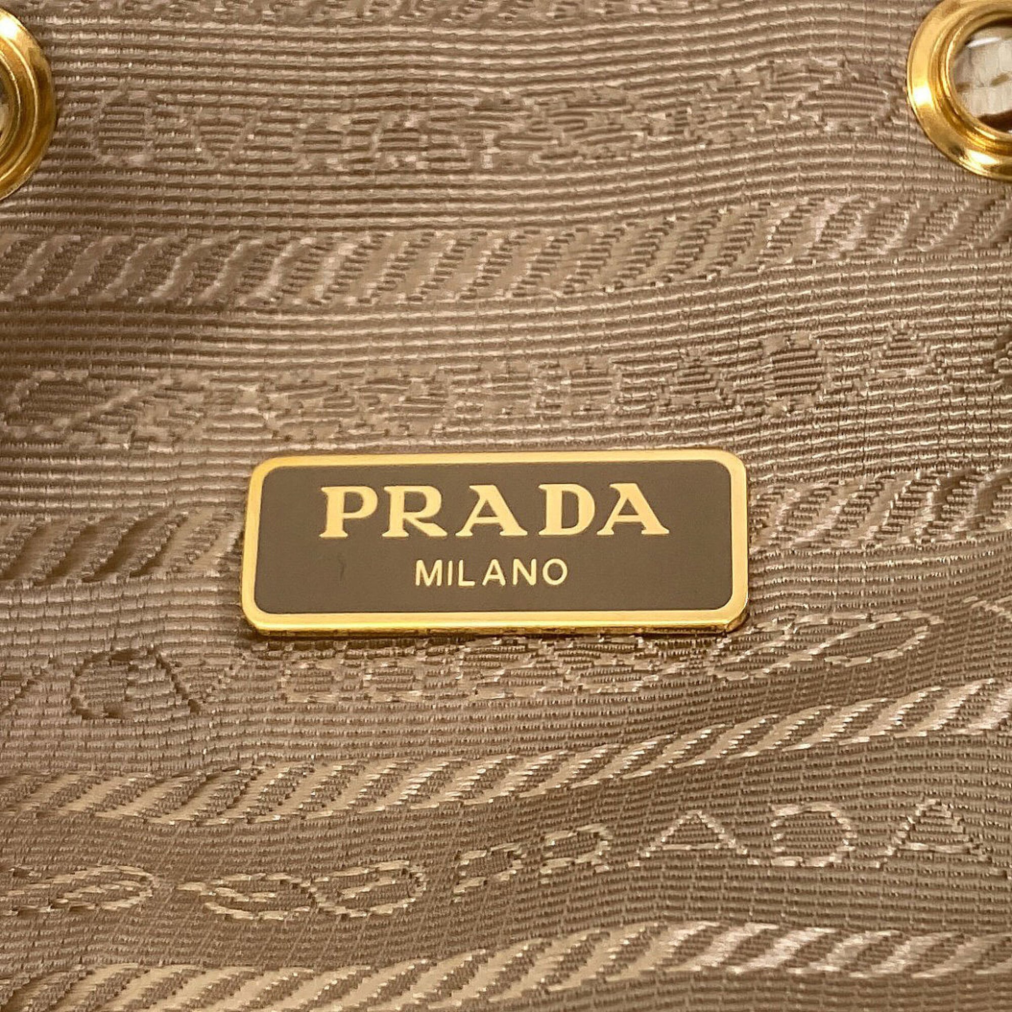 Prada Beige White Canvas Handbag (Pre-Owned)