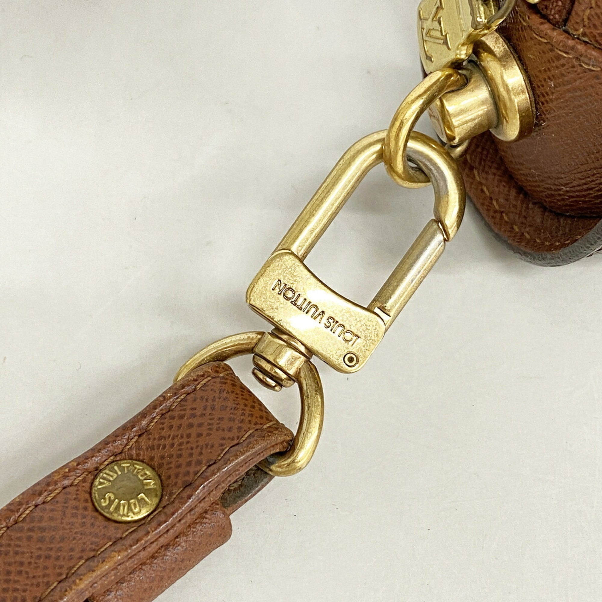Louis Vuitton Brown Clutch Bag (Pre-Owned)