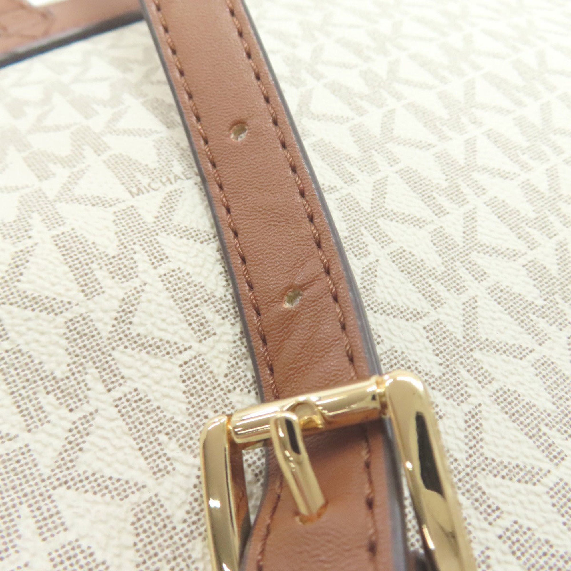 Michael Kors Brown White Leather Pvc Backpack (Pre-Owned)